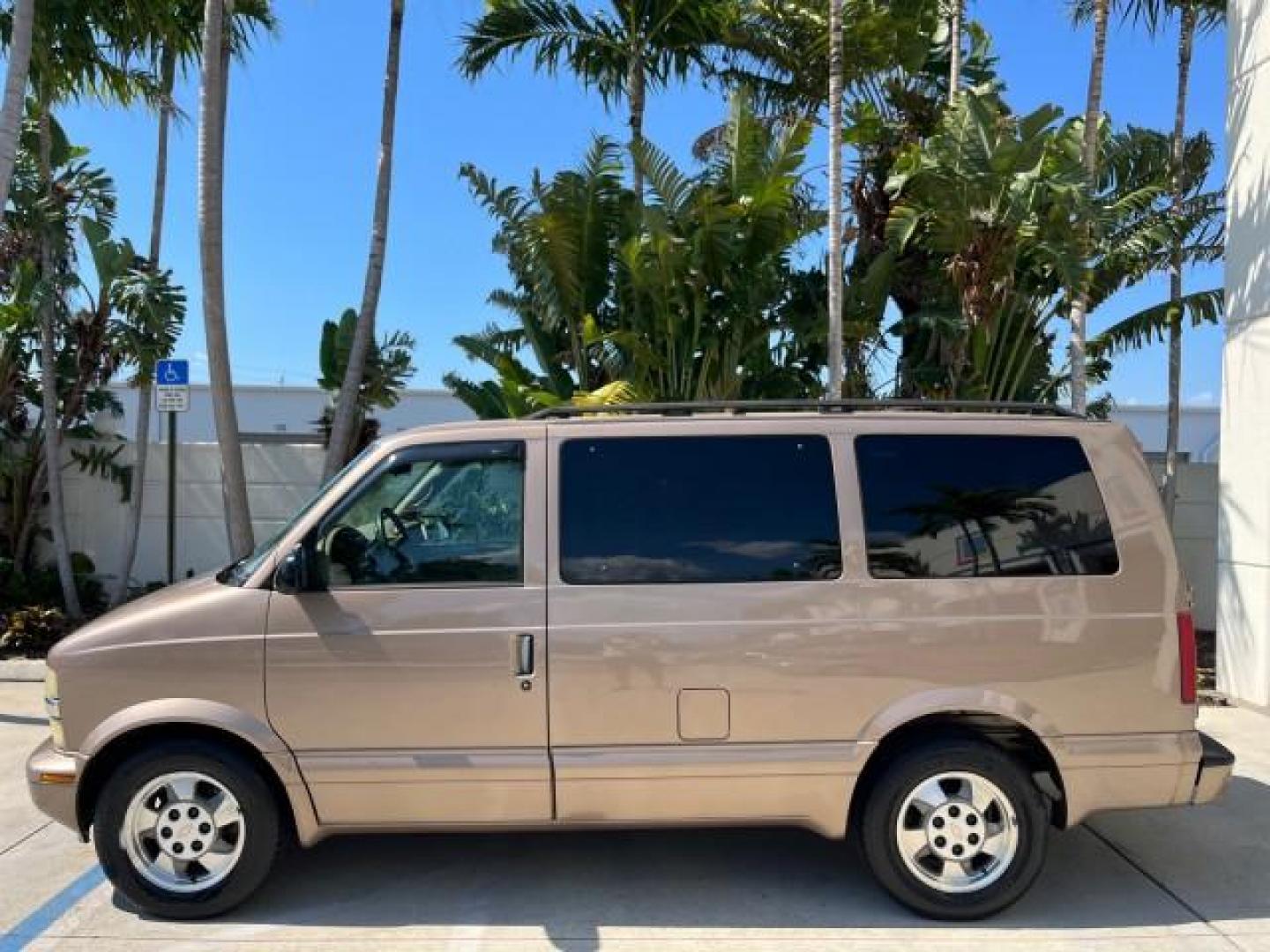 2003 Bronzemist Metallic /Medium Gray Chevrolet Astro Passenger 1 OWNER LOW MILES 79,048 (1GNDM19X83B) with an 4.3L Vortec 4300 V6 MFI Engine engine, Automatic transmission, located at 4701 North Dixie Hwy, Pompano Beach, FL, 33064, (954) 422-2889, 26.240938, -80.123474 - 2003 CHEVROLET ASTRO 8 PASSENGER SEATING ROAD READY 4.3L V6 VIN: 1GNDM19X83B119765 NO ACCIDENTS VAN NO RECALLS 4.3L V6 F OHV 12V 1 OWNER GASOLINE 3 ROW SEATS REAR WHEEL DRIVE LOW MILES 79,048 13 SERVICE RECORDS Approach Lights Cruise Control Front Bucket Seats Premium Sound Premium Sound System RWD - Photo#86