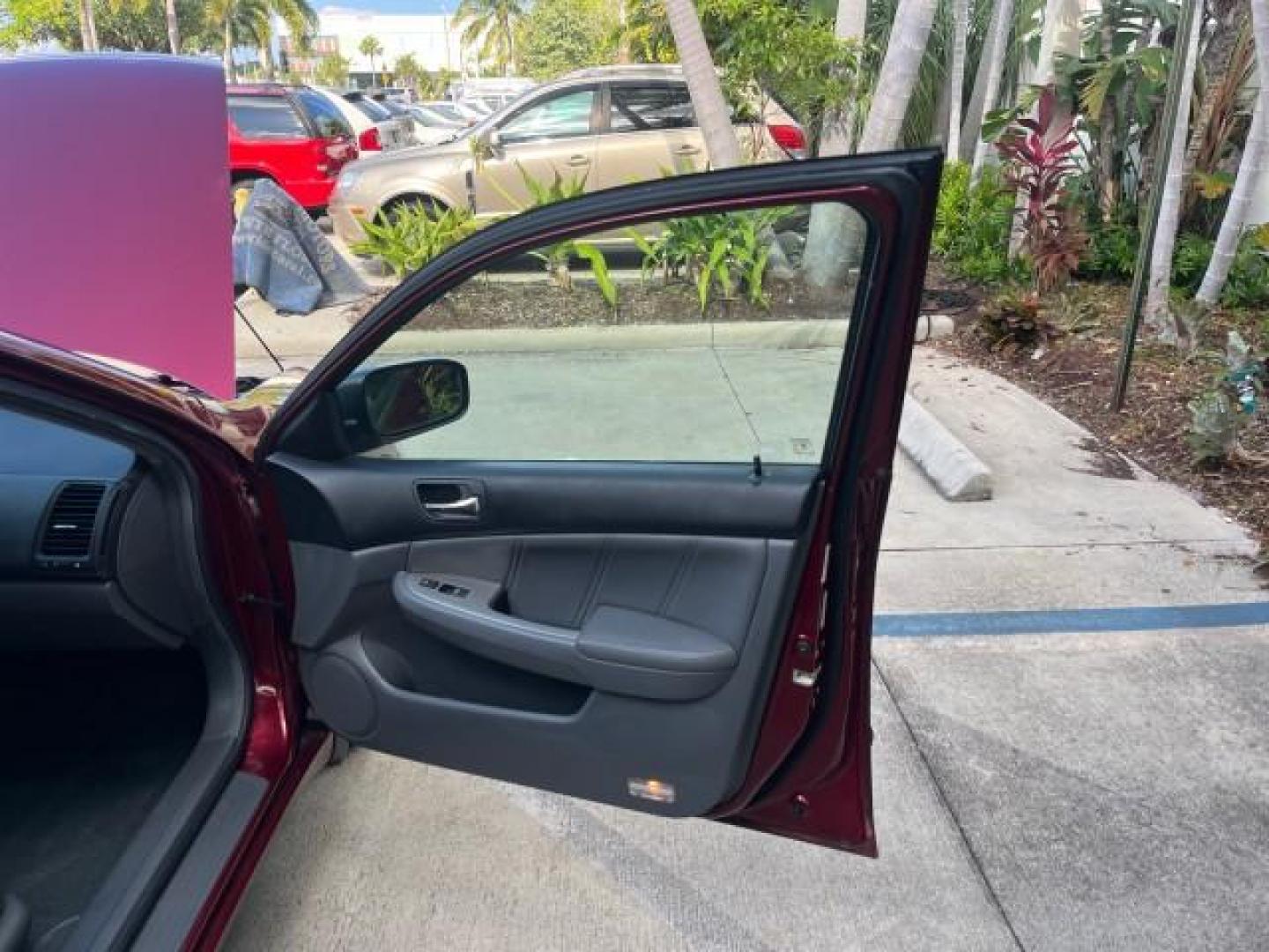 2006 Redondo Red Pearl /Gray Honda Accord Sdn 1 FL EX-L LOW MILES 61,150 (1HGCM56886A) with an 2.4L DOHC MPFI 16-Valve i-VTEC I4 Engine engine, Automatic transmission, located at 4701 North Dixie Hwy, Pompano Beach, FL, 33064, (954) 422-2889, 26.240938, -80.123474 - OUR WEBPAGE FLORIDACARS1.COM HAS OVER 100 PHOTOS AND FREE CARFAX LINK 2006 HONDA ACCORD EX W/LEATHER ROAD READY 2.4L I4 VIN: 1HGCM56886A162961 NO ACCIDENTS 34 MPG SEDAN 4 DR ALL WHEEL ABS NO RECALLS 2.4L I4 F DOHC 16V LOW MILES 61,150 1 OWNER FLORIDA GASOLINE DUAL ZONE AC POWER LEATHER SEATS FRONT W - Photo#11