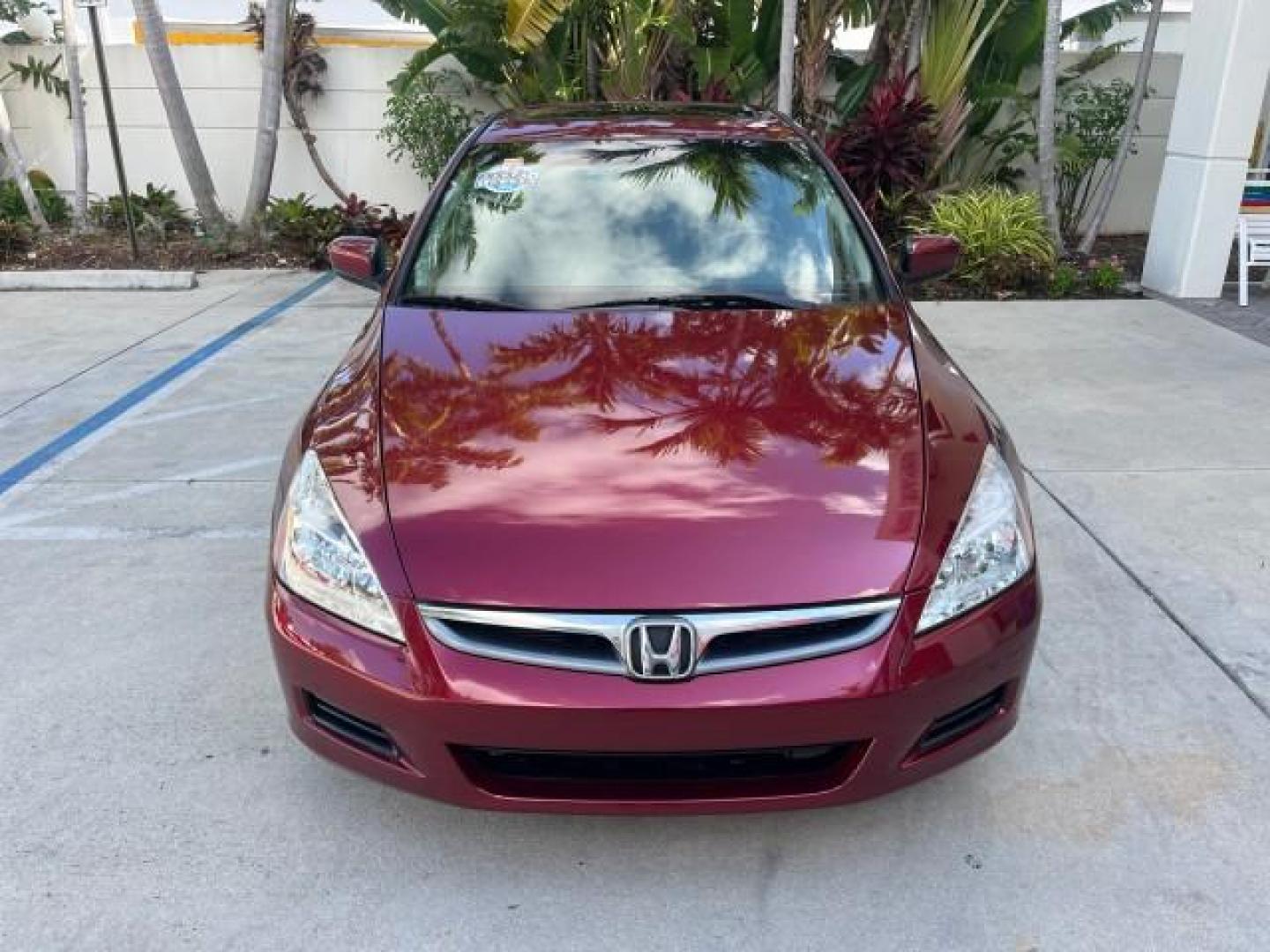 2006 Redondo Red Pearl /Gray Honda Accord Sdn 1 FL EX-L LOW MILES 61,150 (1HGCM56886A) with an 2.4L DOHC MPFI 16-Valve i-VTEC I4 Engine engine, Automatic transmission, located at 4701 North Dixie Hwy, Pompano Beach, FL, 33064, (954) 422-2889, 26.240938, -80.123474 - OUR WEBPAGE FLORIDACARS1.COM HAS OVER 100 PHOTOS AND FREE CARFAX LINK 2006 HONDA ACCORD EX W/LEATHER ROAD READY 2.4L I4 VIN: 1HGCM56886A162961 NO ACCIDENTS 34 MPG SEDAN 4 DR ALL WHEEL ABS NO RECALLS 2.4L I4 F DOHC 16V LOW MILES 61,150 1 OWNER FLORIDA GASOLINE DUAL ZONE AC POWER LEATHER SEATS FRONT W - Photo#2