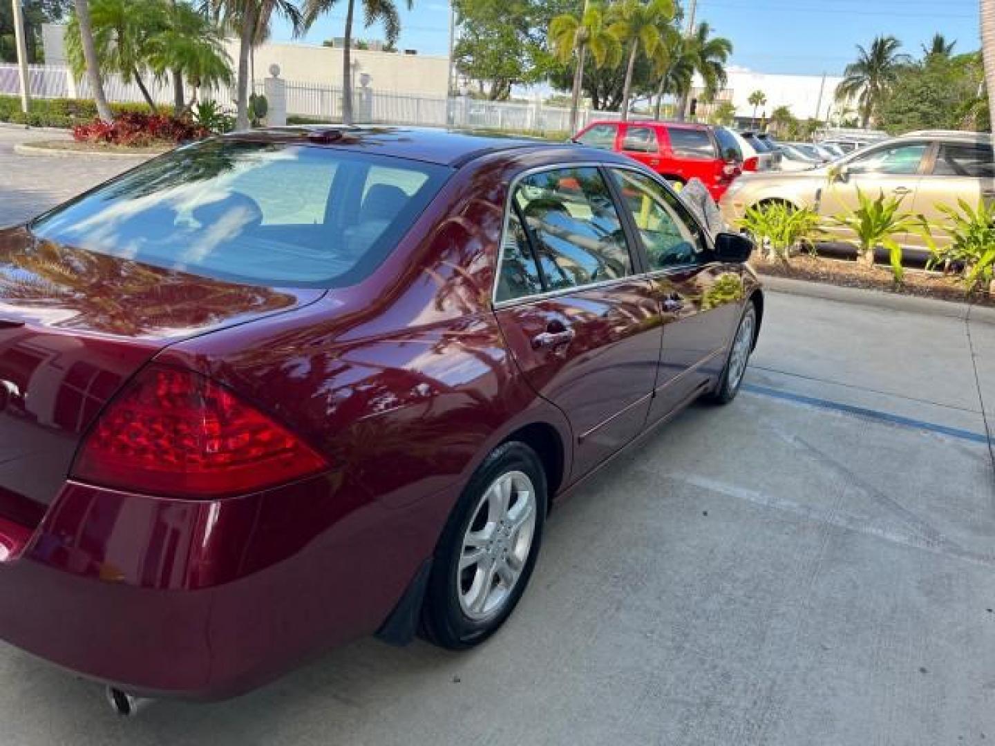 2006 Redondo Red Pearl /Gray Honda Accord Sdn 1 FL EX-L LOW MILES 61,150 (1HGCM56886A) with an 2.4L DOHC MPFI 16-Valve i-VTEC I4 Engine engine, Automatic transmission, located at 4701 North Dixie Hwy, Pompano Beach, FL, 33064, (954) 422-2889, 26.240938, -80.123474 - OUR WEBPAGE FLORIDACARS1.COM HAS OVER 100 PHOTOS AND FREE CARFAX LINK 2006 HONDA ACCORD EX W/LEATHER ROAD READY 2.4L I4 VIN: 1HGCM56886A162961 NO ACCIDENTS 34 MPG SEDAN 4 DR ALL WHEEL ABS NO RECALLS 2.4L I4 F DOHC 16V LOW MILES 61,150 1 OWNER FLORIDA GASOLINE DUAL ZONE AC POWER LEATHER SEATS FRONT W - Photo#78