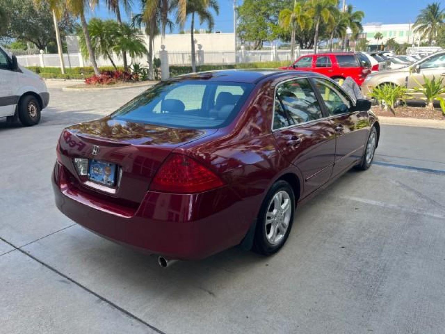 2006 Redondo Red Pearl /Gray Honda Accord Sdn 1 FL EX-L LOW MILES 61,150 (1HGCM56886A) with an 2.4L DOHC MPFI 16-Valve i-VTEC I4 Engine engine, Automatic transmission, located at 4701 North Dixie Hwy, Pompano Beach, FL, 33064, (954) 422-2889, 26.240938, -80.123474 - OUR WEBPAGE FLORIDACARS1.COM HAS OVER 100 PHOTOS AND FREE CARFAX LINK 2006 HONDA ACCORD EX W/LEATHER ROAD READY 2.4L I4 VIN: 1HGCM56886A162961 NO ACCIDENTS 34 MPG SEDAN 4 DR ALL WHEEL ABS NO RECALLS 2.4L I4 F DOHC 16V LOW MILES 61,150 1 OWNER FLORIDA GASOLINE DUAL ZONE AC POWER LEATHER SEATS FRONT W - Photo#7