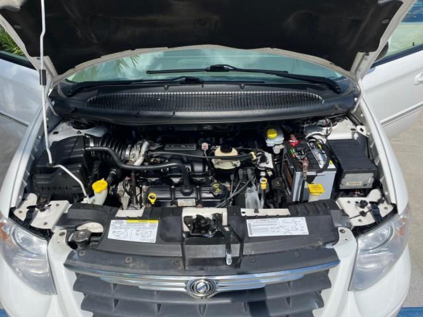 2005 Stone White /Dk Khaki/Lt Graystone Chrysler Town and Country Touring LOW MILES 71,639 (2C8GP54L45R) with an 3.8L OHV SMPI V6 Engine engine, Automatic transmission, located at 4701 North Dixie Hwy, Pompano Beach, FL, 33064, (954) 422-2889, 26.240938, -80.123474 - OUR WEBPAGE FLORIDACARS1.COM HAS OVER 100 PHOTOS AND FREE CARFAX LINK 2005 CHRYSLER TOWN AND COUNTRY TOURING ROAD READY 3.8L V6 VIN: 2C8GP54L45R257251 NO ACCIDENTS VAN DVD NO RECALLS 3.8L V6 F 24V DUAL AC FLORIDA OWNER GASOLINE 3 ROW SEATS POWER SLIDING DOORS FRONT WHEEL DRIVE LOW MILES 71,639 POWER - Photo#17