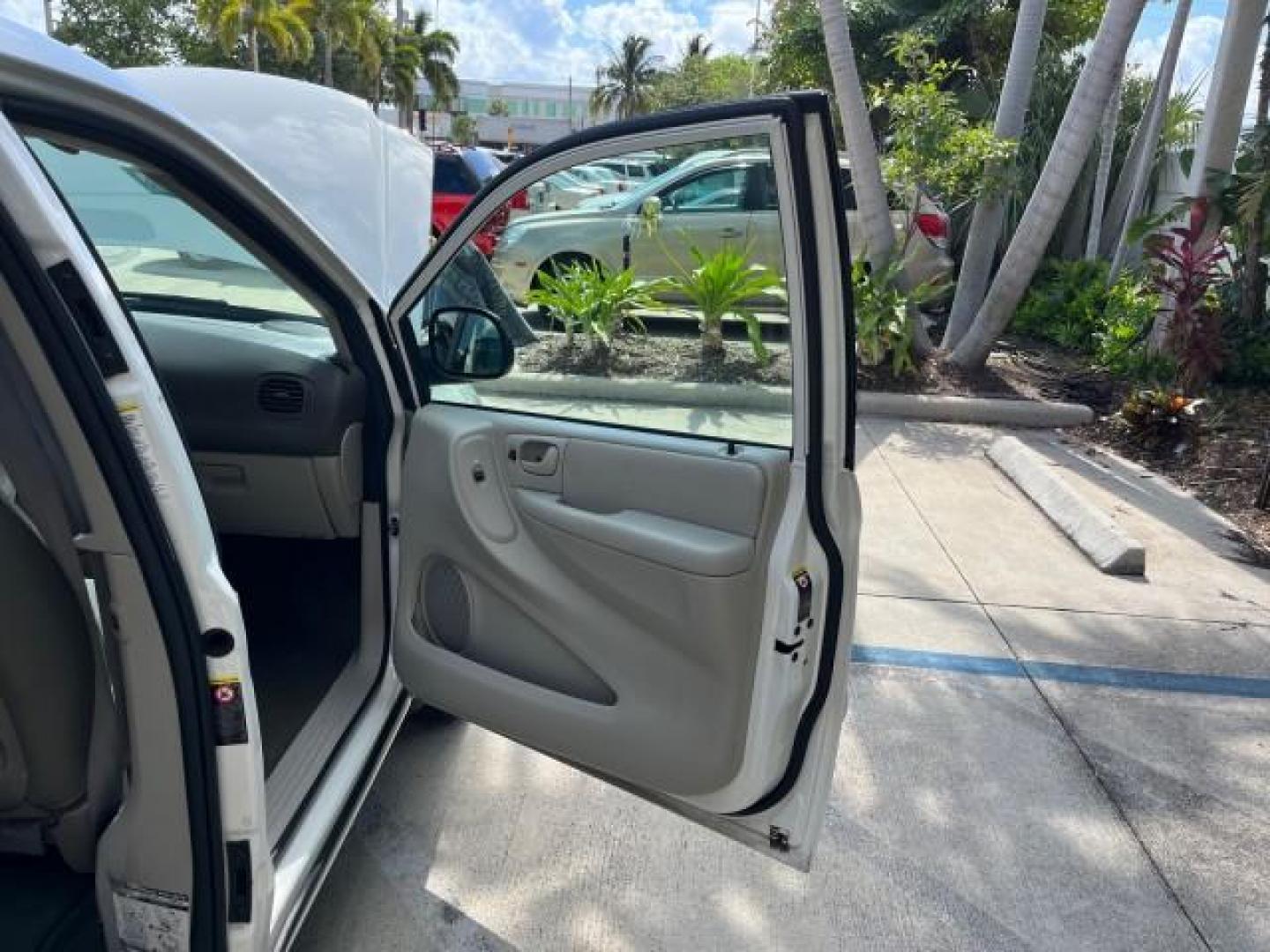 2005 Stone White /Dk Khaki/Lt Graystone Chrysler Town and Country Touring LOW MILES 71,639 (2C8GP54L45R) with an 3.8L OHV SMPI V6 Engine engine, Automatic transmission, located at 4701 North Dixie Hwy, Pompano Beach, FL, 33064, (954) 422-2889, 26.240938, -80.123474 - OUR WEBPAGE FLORIDACARS1.COM HAS OVER 100 PHOTOS AND FREE CARFAX LINK 2005 CHRYSLER TOWN AND COUNTRY TOURING ROAD READY 3.8L V6 VIN: 2C8GP54L45R257251 NO ACCIDENTS VAN DVD NO RECALLS 3.8L V6 F 24V DUAL AC FLORIDA OWNER GASOLINE 3 ROW SEATS POWER SLIDING DOORS FRONT WHEEL DRIVE LOW MILES 71,639 POWER - Photo#11