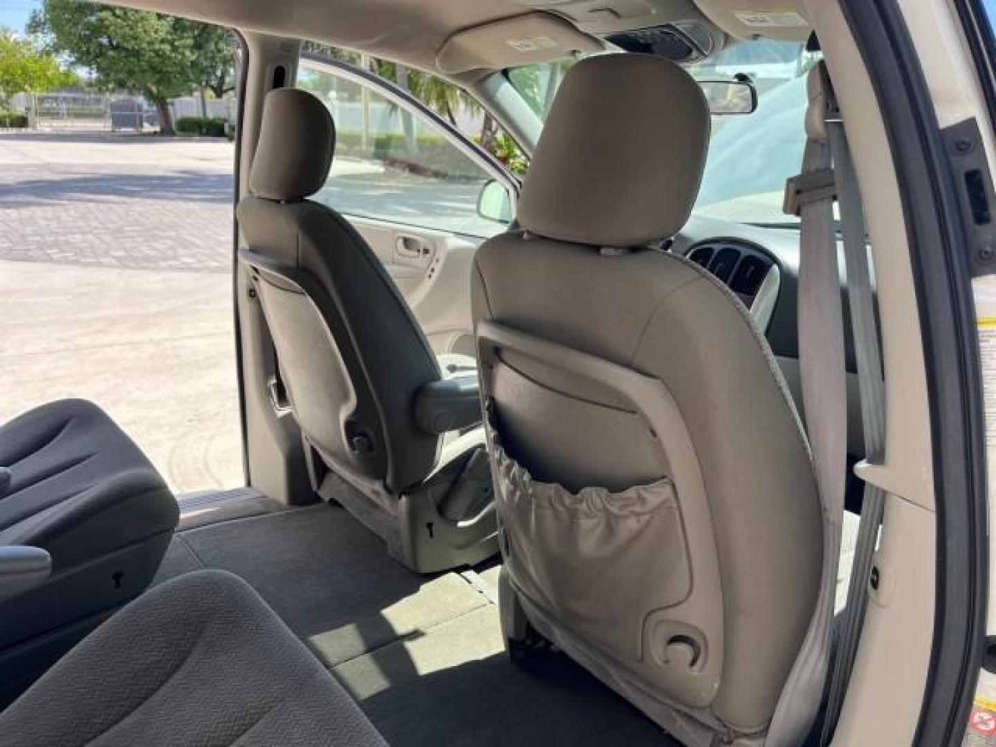 2005 Stone White /Dk Khaki/Lt Graystone Chrysler Town and Country Touring LOW MILES 71,639 (2C8GP54L45R) with an 3.8L OHV SMPI V6 Engine engine, Automatic transmission, located at 4701 North Dixie Hwy, Pompano Beach, FL, 33064, (954) 422-2889, 26.240938, -80.123474 - OUR WEBPAGE FLORIDACARS1.COM HAS OVER 100 PHOTOS AND FREE CARFAX LINK 2005 CHRYSLER TOWN AND COUNTRY TOURING ROAD READY 3.8L V6 VIN: 2C8GP54L45R257251 NO ACCIDENTS VAN DVD NO RECALLS 3.8L V6 F 24V DUAL AC FLORIDA OWNER GASOLINE 3 ROW SEATS POWER SLIDING DOORS FRONT WHEEL DRIVE LOW MILES 71,639 POWER - Photo#31