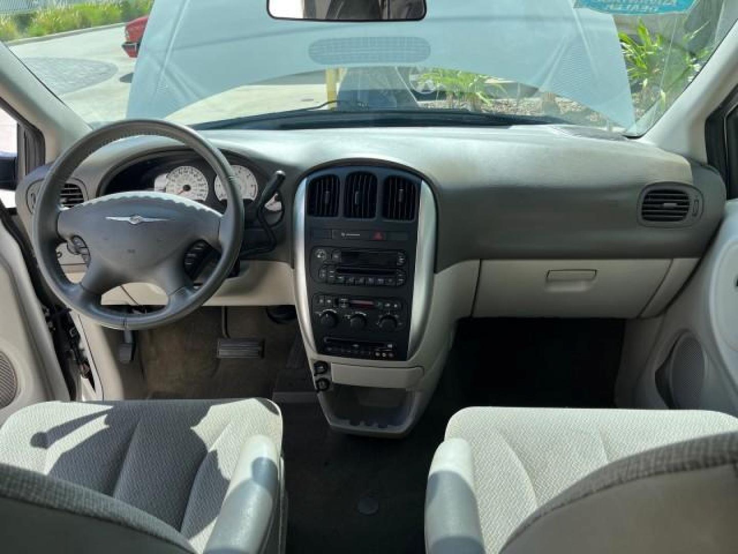 2005 Stone White /Dk Khaki/Lt Graystone Chrysler Town and Country Touring LOW MILES 71,639 (2C8GP54L45R) with an 3.8L OHV SMPI V6 Engine engine, Automatic transmission, located at 4701 North Dixie Hwy, Pompano Beach, FL, 33064, (954) 422-2889, 26.240938, -80.123474 - OUR WEBPAGE FLORIDACARS1.COM HAS OVER 100 PHOTOS AND FREE CARFAX LINK 2005 CHRYSLER TOWN AND COUNTRY TOURING ROAD READY 3.8L V6 VIN: 2C8GP54L45R257251 NO ACCIDENTS VAN DVD NO RECALLS 3.8L V6 F 24V DUAL AC FLORIDA OWNER GASOLINE 3 ROW SEATS POWER SLIDING DOORS FRONT WHEEL DRIVE LOW MILES 71,639 POWER - Photo#32