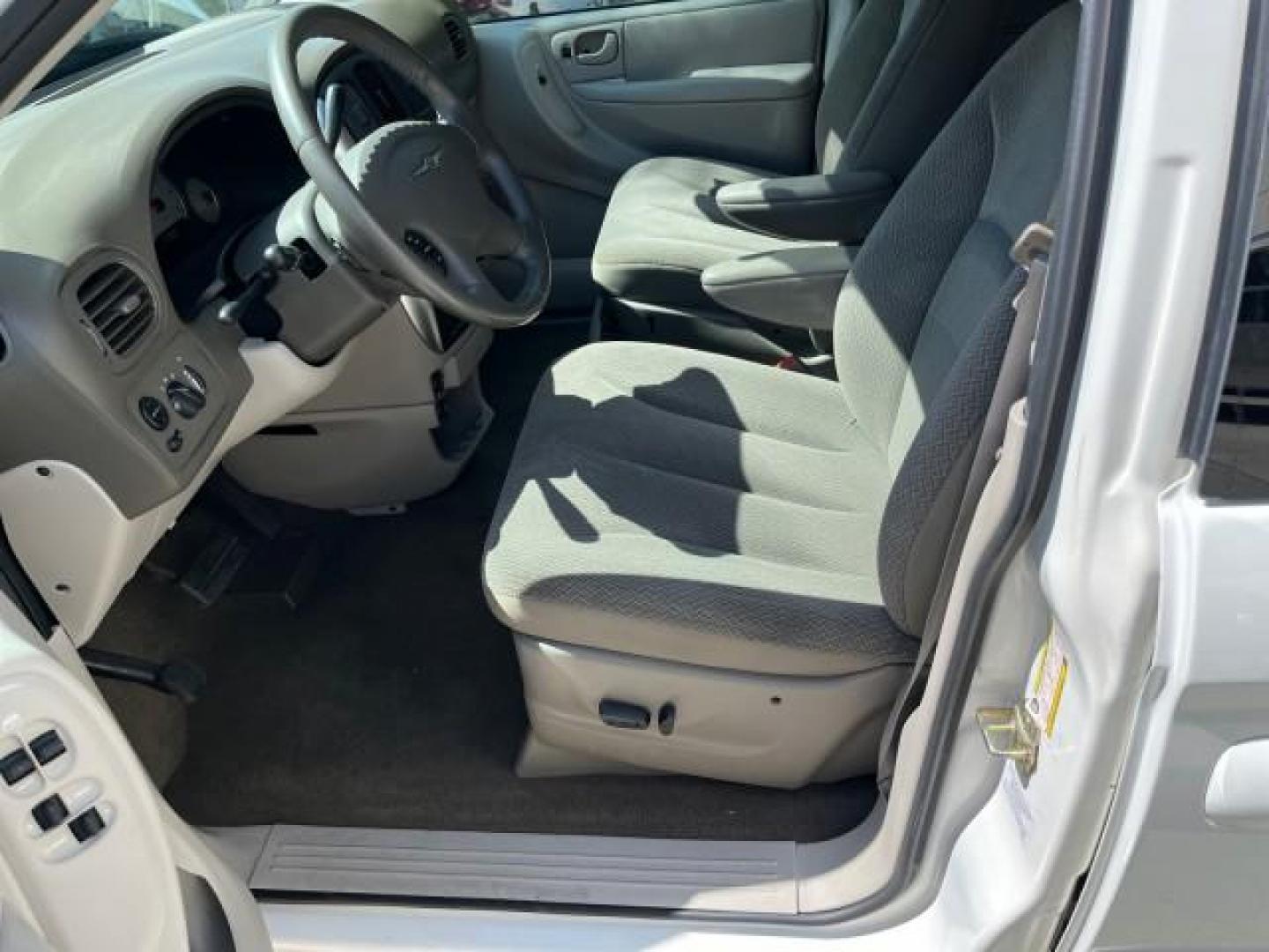 2005 Stone White /Dk Khaki/Lt Graystone Chrysler Town and Country Touring LOW MILES 71,639 (2C8GP54L45R) with an 3.8L OHV SMPI V6 Engine engine, Automatic transmission, located at 4701 North Dixie Hwy, Pompano Beach, FL, 33064, (954) 422-2889, 26.240938, -80.123474 - OUR WEBPAGE FLORIDACARS1.COM HAS OVER 100 PHOTOS AND FREE CARFAX LINK 2005 CHRYSLER TOWN AND COUNTRY TOURING ROAD READY 3.8L V6 VIN: 2C8GP54L45R257251 NO ACCIDENTS VAN DVD NO RECALLS 3.8L V6 F 24V DUAL AC FLORIDA OWNER GASOLINE 3 ROW SEATS POWER SLIDING DOORS FRONT WHEEL DRIVE LOW MILES 71,639 POWER - Photo#51