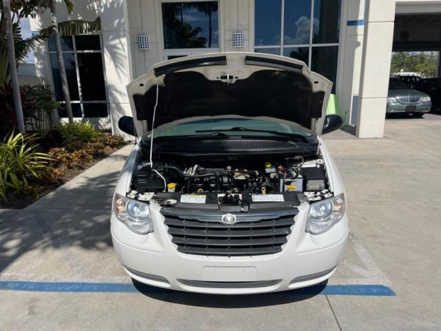 2005 Stone White /Dk Khaki/Lt Graystone Chrysler Town and Country Touring LOW MILES 71,639 (2C8GP54L45R) with an 3.8L OHV SMPI V6 Engine engine, Automatic transmission, located at 4701 North Dixie Hwy, Pompano Beach, FL, 33064, (954) 422-2889, 26.240938, -80.123474 - OUR WEBPAGE FLORIDACARS1.COM HAS OVER 100 PHOTOS AND FREE CARFAX LINK 2005 CHRYSLER TOWN AND COUNTRY TOURING ROAD READY 3.8L V6 VIN: 2C8GP54L45R257251 NO ACCIDENTS VAN DVD NO RECALLS 3.8L V6 F 24V DUAL AC FLORIDA OWNER GASOLINE 3 ROW SEATS POWER SLIDING DOORS FRONT WHEEL DRIVE LOW MILES 71,639 POWER - Photo#73