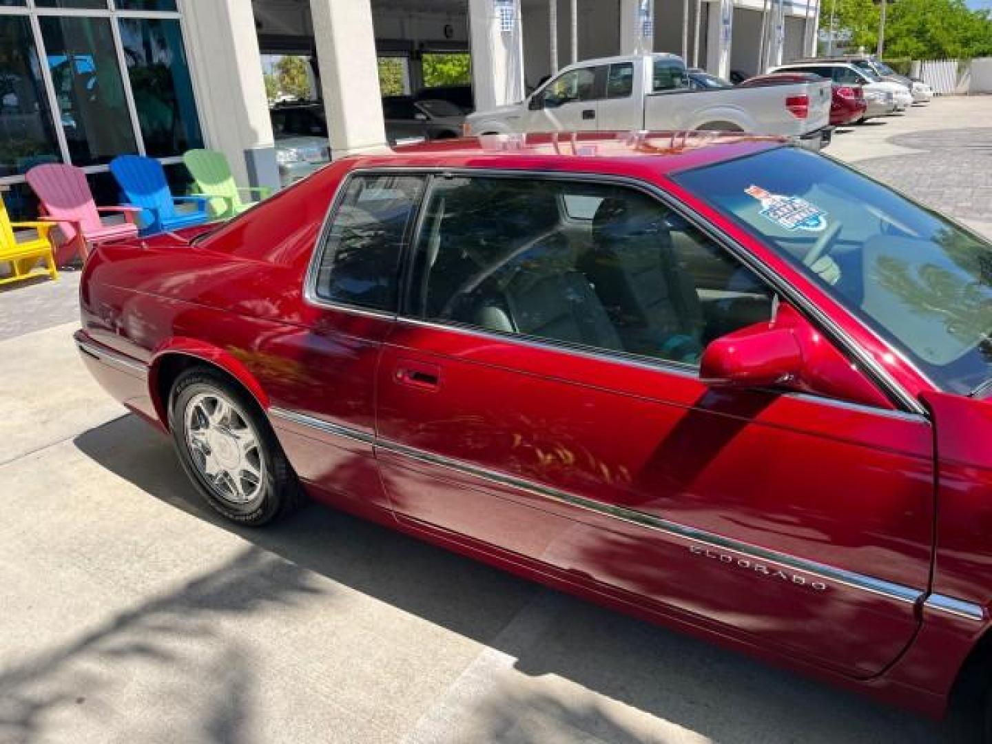 1998 Mulberry /Cappuccino Cream Cadillac Eldorado 1 FL LOW MILES 68,750 (1G6EL12Y6WU) with an 4.6L SFI DOHC V8 275hp Northstar Engine engine, Automatic transmission, located at 4701 North Dixie Hwy, Pompano Beach, FL, 33064, (954) 422-2889, 26.240938, -80.123474 - OUR WEBPAGE FLORIDACARS1.COM HAS OVER 100 PHOTOS AND FREE CARFAX LINK 1998 CADILLAC ELDORADO NEW $ 41,565 ROAD READY VIN: 1G6EL12Y6WU617817 NO ACCIDENTS NO RECALLS COUPE 1 OWNER FLORIDA 4.6L V8 F DOHC 32V LOW MILES 68,750 GASOLINE POWER LEATHER SEATS FRONT WHEEL DRIVE 4.6L V8 27 MPG 5 SERVICE RECORD - Photo#66