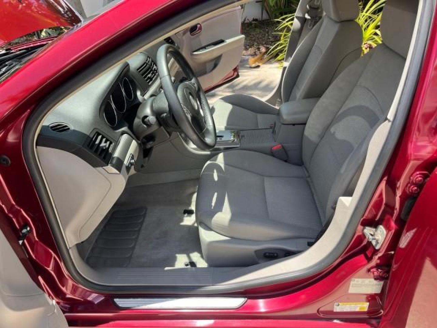 2009 Red Jewel Tintcoat /Gray Saturn Aura XE LOW MILES 33,956 (1G8ZS57B29F) with an Ecotec 2.4L 4-Cyl Engine engine, Automatic transmission, located at 4701 North Dixie Hwy, Pompano Beach, FL, 33064, (954) 422-2889, 26.240938, -80.123474 - OUR WEBPAGE FLORIDACARS1.COM HAS OVER 100 PHOTOS AND FREE CARFAX LINK 2009 SATURN AURA XE ROAD READY 2.4L I4 VIN: 1G8ZS57B29F146703 LOW MILES 33,956 SEDAN 4 DR NO ACCIDENTS 2.4L I4 F DOHC 16V NO RECALLS 33 MPG GASOLINE POWER SEATS POWER SUNROOF FRONT WHEEL DRIVE VERY CLEAN 12 SERVICE RECORDS Active - Photo#10