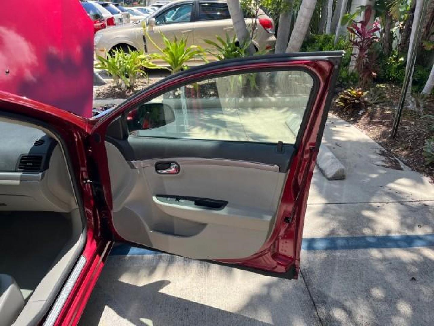 2009 Red Jewel Tintcoat /Gray Saturn Aura XE LOW MILES 33,956 (1G8ZS57B29F) with an Ecotec 2.4L 4-Cyl Engine engine, Automatic transmission, located at 4701 North Dixie Hwy, Pompano Beach, FL, 33064, (954) 422-2889, 26.240938, -80.123474 - OUR WEBPAGE FLORIDACARS1.COM HAS OVER 100 PHOTOS AND FREE CARFAX LINK 2009 SATURN AURA XE ROAD READY 2.4L I4 VIN: 1G8ZS57B29F146703 LOW MILES 33,956 SEDAN 4 DR NO ACCIDENTS 2.4L I4 F DOHC 16V NO RECALLS 33 MPG GASOLINE POWER SEATS POWER SUNROOF FRONT WHEEL DRIVE VERY CLEAN 12 SERVICE RECORDS Active - Photo#11