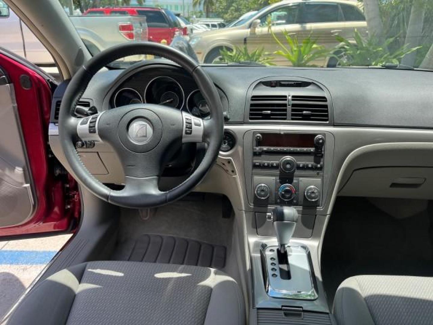 2009 Red Jewel Tintcoat /Gray Saturn Aura XE LOW MILES 33,956 (1G8ZS57B29F) with an Ecotec 2.4L 4-Cyl Engine engine, Automatic transmission, located at 4701 North Dixie Hwy, Pompano Beach, FL, 33064, (954) 422-2889, 26.240938, -80.123474 - OUR WEBPAGE FLORIDACARS1.COM HAS OVER 100 PHOTOS AND FREE CARFAX LINK 2009 SATURN AURA XE ROAD READY 2.4L I4 VIN: 1G8ZS57B29F146703 LOW MILES 33,956 SEDAN 4 DR NO ACCIDENTS 2.4L I4 F DOHC 16V NO RECALLS 33 MPG GASOLINE POWER SEATS POWER SUNROOF FRONT WHEEL DRIVE VERY CLEAN 12 SERVICE RECORDS Active - Photo#36