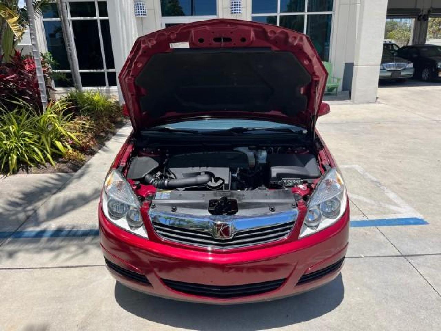 2009 Red Jewel Tintcoat /Gray Saturn Aura XE LOW MILES 33,956 (1G8ZS57B29F) with an Ecotec 2.4L 4-Cyl Engine engine, Automatic transmission, located at 4701 North Dixie Hwy, Pompano Beach, FL, 33064, (954) 422-2889, 26.240938, -80.123474 - OUR WEBPAGE FLORIDACARS1.COM HAS OVER 100 PHOTOS AND FREE CARFAX LINK 2009 SATURN AURA XE ROAD READY 2.4L I4 VIN: 1G8ZS57B29F146703 LOW MILES 33,956 SEDAN 4 DR NO ACCIDENTS 2.4L I4 F DOHC 16V NO RECALLS 33 MPG GASOLINE POWER SEATS POWER SUNROOF FRONT WHEEL DRIVE VERY CLEAN 12 SERVICE RECORDS Active - Photo#70