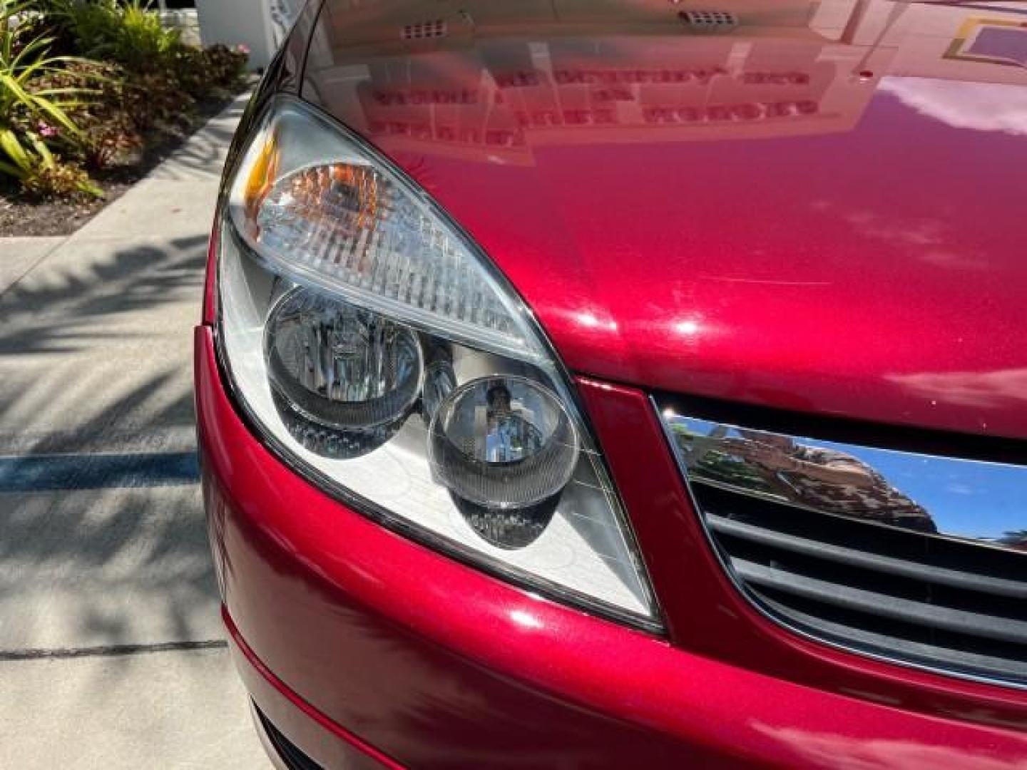 2009 Red Jewel Tintcoat /Gray Saturn Aura XE LOW MILES 33,956 (1G8ZS57B29F) with an Ecotec 2.4L 4-Cyl Engine engine, Automatic transmission, located at 4701 North Dixie Hwy, Pompano Beach, FL, 33064, (954) 422-2889, 26.240938, -80.123474 - OUR WEBPAGE FLORIDACARS1.COM HAS OVER 100 PHOTOS AND FREE CARFAX LINK 2009 SATURN AURA XE ROAD READY 2.4L I4 VIN: 1G8ZS57B29F146703 LOW MILES 33,956 SEDAN 4 DR NO ACCIDENTS 2.4L I4 F DOHC 16V NO RECALLS 33 MPG GASOLINE POWER SEATS POWER SUNROOF FRONT WHEEL DRIVE VERY CLEAN 12 SERVICE RECORDS Active - Photo#78