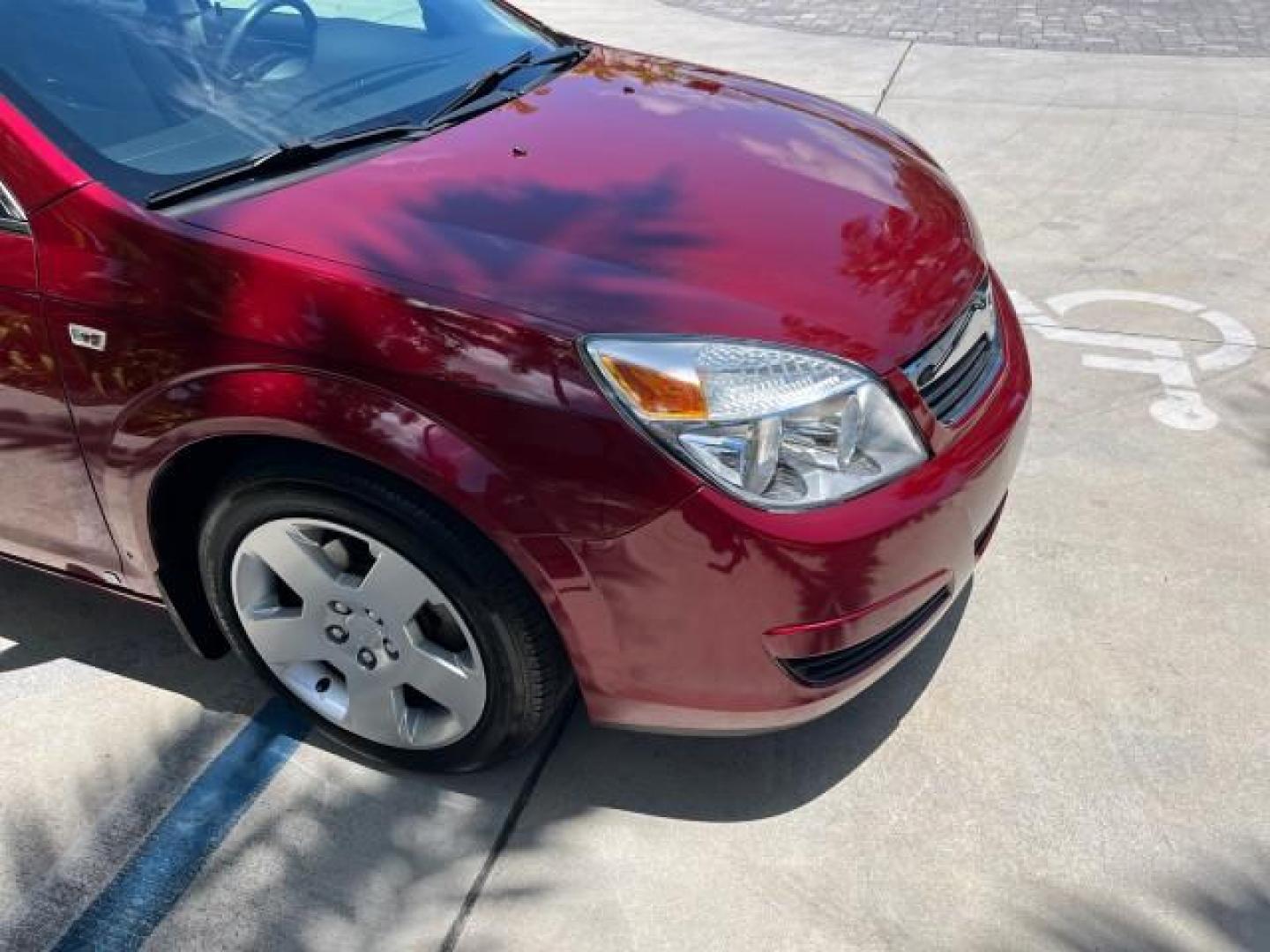 2009 Red Jewel Tintcoat /Gray Saturn Aura XE LOW MILES 33,956 (1G8ZS57B29F) with an Ecotec 2.4L 4-Cyl Engine engine, Automatic transmission, located at 4701 North Dixie Hwy, Pompano Beach, FL, 33064, (954) 422-2889, 26.240938, -80.123474 - OUR WEBPAGE FLORIDACARS1.COM HAS OVER 100 PHOTOS AND FREE CARFAX LINK 2009 SATURN AURA XE ROAD READY 2.4L I4 VIN: 1G8ZS57B29F146703 LOW MILES 33,956 SEDAN 4 DR NO ACCIDENTS 2.4L I4 F DOHC 16V NO RECALLS 33 MPG GASOLINE POWER SEATS POWER SUNROOF FRONT WHEEL DRIVE VERY CLEAN 12 SERVICE RECORDS Active - Photo#84