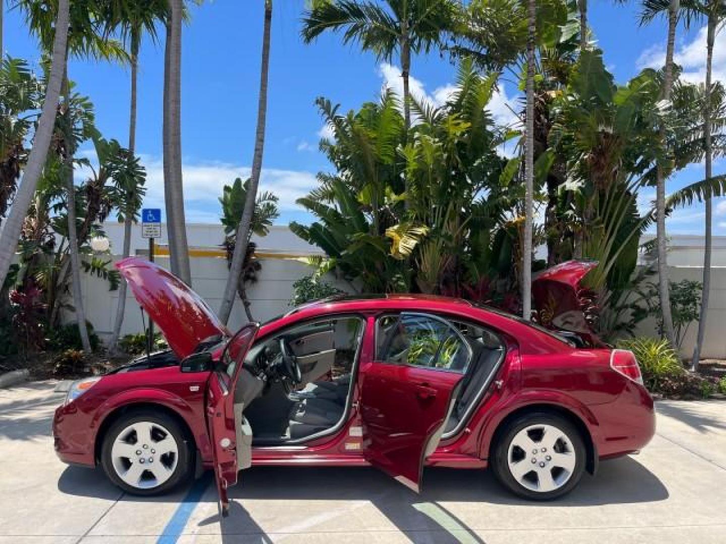 2009 Red Jewel Tintcoat /Gray Saturn Aura XE LOW MILES 33,956 (1G8ZS57B29F) with an Ecotec 2.4L 4-Cyl Engine engine, Automatic transmission, located at 4701 North Dixie Hwy, Pompano Beach, FL, 33064, (954) 422-2889, 26.240938, -80.123474 - OUR WEBPAGE FLORIDACARS1.COM HAS OVER 100 PHOTOS AND FREE CARFAX LINK 2009 SATURN AURA XE ROAD READY 2.4L I4 VIN: 1G8ZS57B29F146703 LOW MILES 33,956 SEDAN 4 DR NO ACCIDENTS 2.4L I4 F DOHC 16V NO RECALLS 33 MPG GASOLINE POWER SEATS POWER SUNROOF FRONT WHEEL DRIVE VERY CLEAN 12 SERVICE RECORDS Active - Photo#8