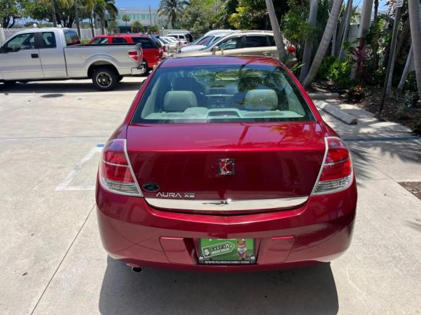 2009 Red Jewel Tintcoat /Gray Saturn Aura XE LOW MILES 33,956 (1G8ZS57B29F) with an Ecotec 2.4L 4-Cyl Engine engine, Automatic transmission, located at 4701 North Dixie Hwy, Pompano Beach, FL, 33064, (954) 422-2889, 26.240938, -80.123474 - OUR WEBPAGE FLORIDACARS1.COM HAS OVER 100 PHOTOS AND FREE CARFAX LINK 2009 SATURN AURA XE ROAD READY 2.4L I4 VIN: 1G8ZS57B29F146703 LOW MILES 33,956 SEDAN 4 DR NO ACCIDENTS 2.4L I4 F DOHC 16V NO RECALLS 33 MPG GASOLINE POWER SEATS POWER SUNROOF FRONT WHEEL DRIVE VERY CLEAN 12 SERVICE RECORDS Active - Photo#97