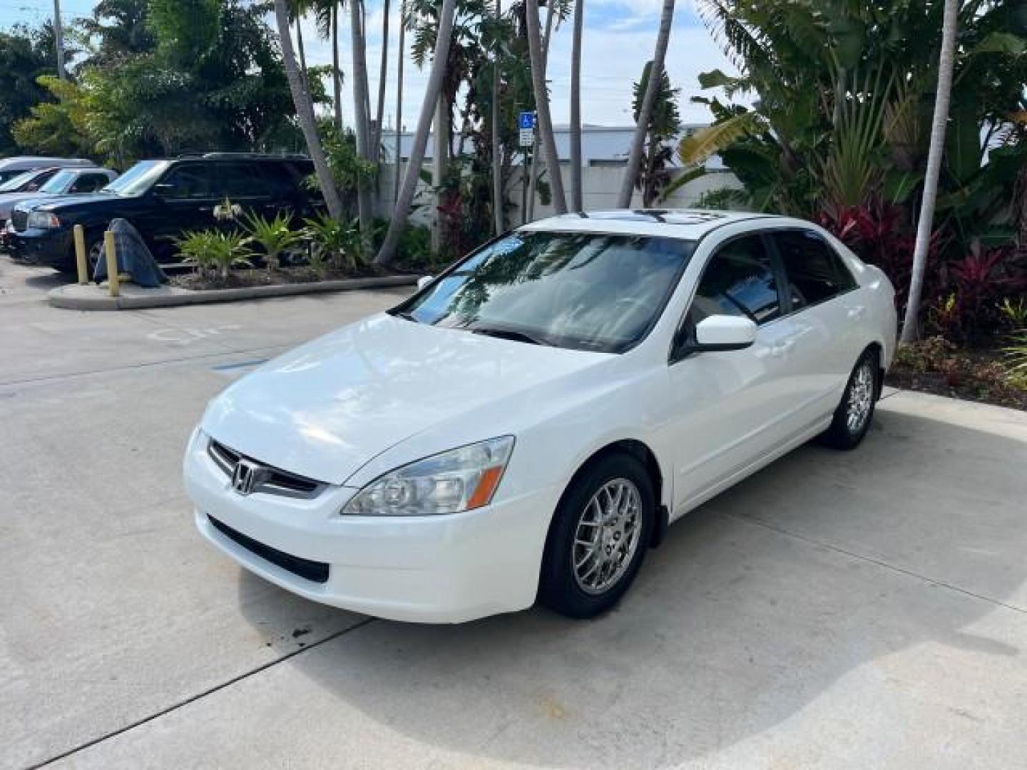 2004 Taffeta White /Ivory Honda Accord Sdn EX LOW MILES 70,858 (1HGCM66584A) with an 3.0L SOHC MPFI 24-Valve VTEC V6 Engine engine, Automatic transmission, located at 4701 North Dixie Hwy, Pompano Beach, FL, 33064, (954) 422-2889, 26.240938, -80.123474 - OUR WEBPAGE FLORIDACARS1.COM HAS OVER 100 PHOTOS AND FREE CARFAX LINK 2004 HONDA ACCORD EX V-6 ROAD READY 3.0L V6 VIN: 1HGCM66584A005374 NO RECALLS 30 MPG SEDAN 4 DR FLORIDA OWNER 3.0L V6 F SOHC 24V LOW MILES 70,858 GASOLINE LEATHER SEATS FRONT WHEEL DRIVE 22 SERVICE RECORDS SUNROOF DUAL AC Alloy Wh - Photo#3