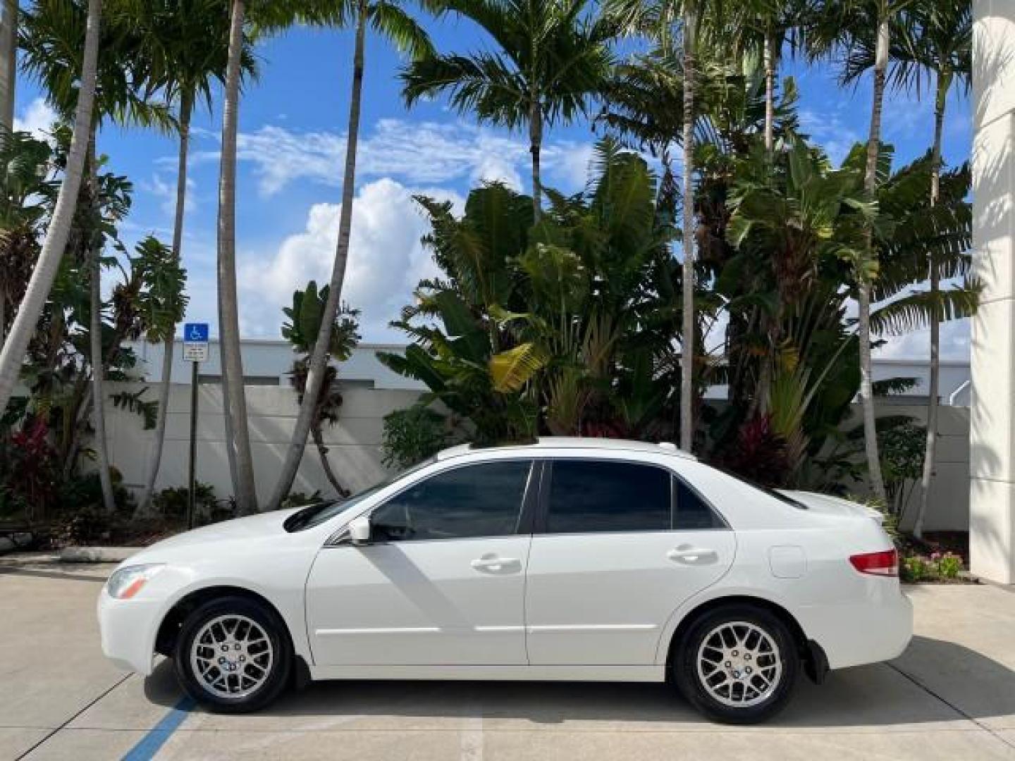 2004 Taffeta White /Ivory Honda Accord Sdn EX LOW MILES 70,858 (1HGCM66584A) with an 3.0L SOHC MPFI 24-Valve VTEC V6 Engine engine, Automatic transmission, located at 4701 North Dixie Hwy, Pompano Beach, FL, 33064, (954) 422-2889, 26.240938, -80.123474 - OUR WEBPAGE FLORIDACARS1.COM HAS OVER 100 PHOTOS AND FREE CARFAX LINK 2004 HONDA ACCORD EX V-6 ROAD READY 3.0L V6 VIN: 1HGCM66584A005374 NO RECALLS 30 MPG SEDAN 4 DR FLORIDA OWNER 3.0L V6 F SOHC 24V LOW MILES 70,858 GASOLINE LEATHER SEATS FRONT WHEEL DRIVE 22 SERVICE RECORDS SUNROOF DUAL AC Alloy Wh - Photo#4