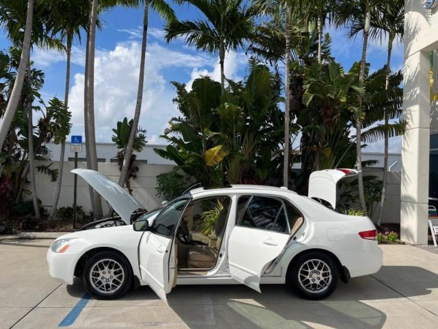 2004 Taffeta White /Ivory Honda Accord Sdn EX LOW MILES 70,858 (1HGCM66584A) with an 3.0L SOHC MPFI 24-Valve VTEC V6 Engine engine, Automatic transmission, located at 4701 North Dixie Hwy, Pompano Beach, FL, 33064, (954) 422-2889, 26.240938, -80.123474 - OUR WEBPAGE FLORIDACARS1.COM HAS OVER 100 PHOTOS AND FREE CARFAX LINK 2004 HONDA ACCORD EX V-6 ROAD READY 3.0L V6 VIN: 1HGCM66584A005374 NO RECALLS 30 MPG SEDAN 4 DR FLORIDA OWNER 3.0L V6 F SOHC 24V LOW MILES 70,858 GASOLINE LEATHER SEATS FRONT WHEEL DRIVE 22 SERVICE RECORDS SUNROOF DUAL AC Alloy Wh - Photo#8