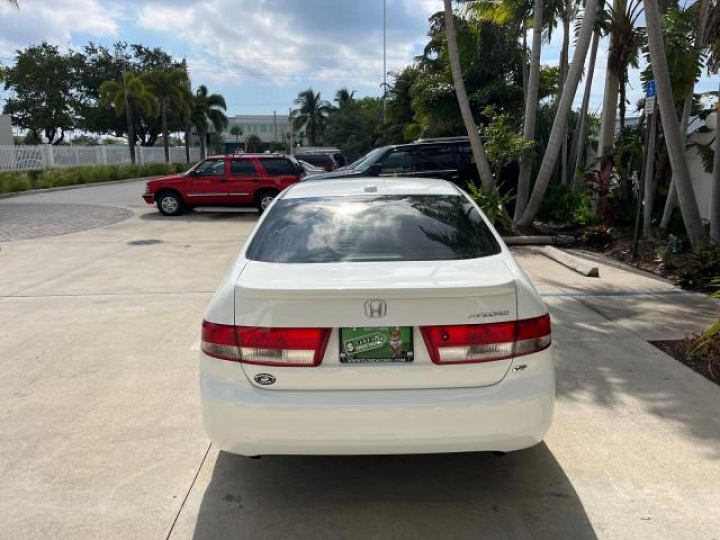 2004 Taffeta White /Ivory Honda Accord Sdn EX LOW MILES 70,858 (1HGCM66584A) with an 3.0L SOHC MPFI 24-Valve VTEC V6 Engine engine, Automatic transmission, located at 4701 North Dixie Hwy, Pompano Beach, FL, 33064, (954) 422-2889, 26.240938, -80.123474 - OUR WEBPAGE FLORIDACARS1.COM HAS OVER 100 PHOTOS AND FREE CARFAX LINK 2004 HONDA ACCORD EX V-6 ROAD READY 3.0L V6 VIN: 1HGCM66584A005374 NO RECALLS 30 MPG SEDAN 4 DR FLORIDA OWNER 3.0L V6 F SOHC 24V LOW MILES 70,858 GASOLINE LEATHER SEATS FRONT WHEEL DRIVE 22 SERVICE RECORDS SUNROOF DUAL AC Alloy Wh - Photo#94