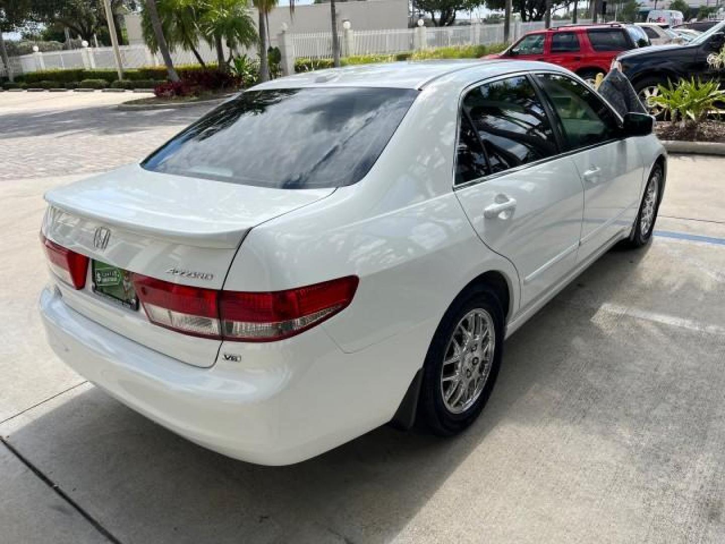 2004 Taffeta White /Ivory Honda Accord Sdn EX LOW MILES 70,858 (1HGCM66584A) with an 3.0L SOHC MPFI 24-Valve VTEC V6 Engine engine, Automatic transmission, located at 4701 North Dixie Hwy, Pompano Beach, FL, 33064, (954) 422-2889, 26.240938, -80.123474 - OUR WEBPAGE FLORIDACARS1.COM HAS OVER 100 PHOTOS AND FREE CARFAX LINK 2004 HONDA ACCORD EX V-6 ROAD READY 3.0L V6 VIN: 1HGCM66584A005374 NO RECALLS 30 MPG SEDAN 4 DR FLORIDA OWNER 3.0L V6 F SOHC 24V LOW MILES 70,858 GASOLINE LEATHER SEATS FRONT WHEEL DRIVE 22 SERVICE RECORDS SUNROOF DUAL AC Alloy Wh - Photo#96