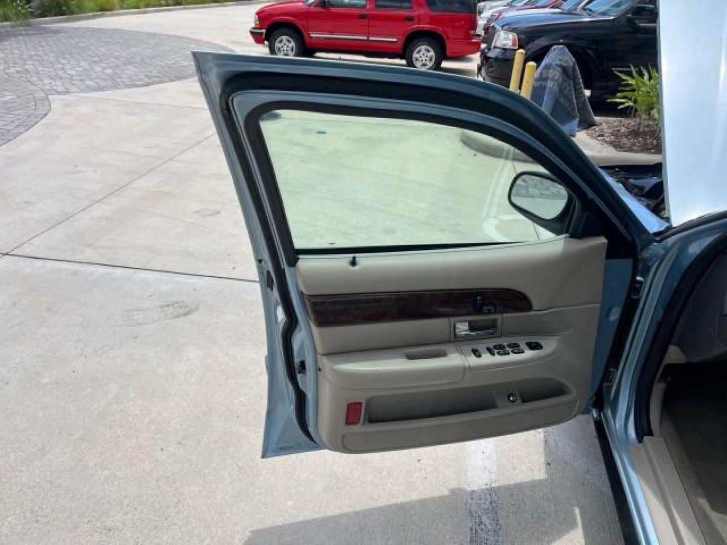 2007 Light Ice Blue Metallic /Medium Light Stone Mercury Grand Marquis LS LOW MILES 63,188 (2MEFM75V77X) with an 4.6L SOHC FFV V8 Engine engine, Automatic transmission, located at 4701 North Dixie Hwy, Pompano Beach, FL, 33064, (954) 422-2889, 26.240938, -80.123474 - OUR WEBPAGE FLORIDACARS1.COM HAS OVER 100 PHOTOS AND FREE CARFAX LINK 2007 MERCURY GRAND MARQUIS LS ROAD READY 4.6L V8 VIN: 2MEFM75V77X617644 FLORIDA OWNER SEDAN 4 DR LOW MILES 63,188 4.6L V8 F SOHC NO RECALLS FLEX FUEL 15 SERVICE RECORDS REAR WHEEL DRIVE POWER LEATHER SEATS Adaptive Headlights Adju - Photo#9