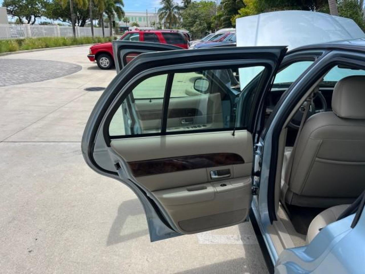 2007 Light Ice Blue Metallic /Medium Light Stone Mercury Grand Marquis LS LOW MILES 63,188 (2MEFM75V77X) with an 4.6L SOHC FFV V8 Engine engine, Automatic transmission, located at 4701 North Dixie Hwy, Pompano Beach, FL, 33064, (954) 422-2889, 26.240938, -80.123474 - OUR WEBPAGE FLORIDACARS1.COM HAS OVER 100 PHOTOS AND FREE CARFAX LINK 2007 MERCURY GRAND MARQUIS LS ROAD READY 4.6L V8 VIN: 2MEFM75V77X617644 FLORIDA OWNER SEDAN 4 DR LOW MILES 63,188 4.6L V8 F SOHC NO RECALLS FLEX FUEL 15 SERVICE RECORDS REAR WHEEL DRIVE POWER LEATHER SEATS Adaptive Headlights Adju - Photo#13