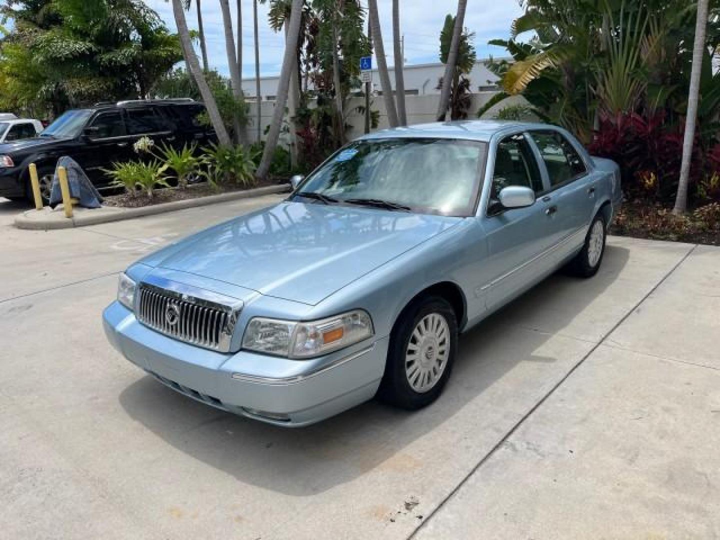 2007 Light Ice Blue Metallic /Medium Light Stone Mercury Grand Marquis LS LOW MILES 63,188 (2MEFM75V77X) with an 4.6L SOHC FFV V8 Engine engine, Automatic transmission, located at 4701 North Dixie Hwy, Pompano Beach, FL, 33064, (954) 422-2889, 26.240938, -80.123474 - OUR WEBPAGE FLORIDACARS1.COM HAS OVER 100 PHOTOS AND FREE CARFAX LINK 2007 MERCURY GRAND MARQUIS LS ROAD READY 4.6L V8 VIN: 2MEFM75V77X617644 FLORIDA OWNER SEDAN 4 DR LOW MILES 63,188 4.6L V8 F SOHC NO RECALLS FLEX FUEL 15 SERVICE RECORDS REAR WHEEL DRIVE POWER LEATHER SEATS Adaptive Headlights Adju - Photo#3