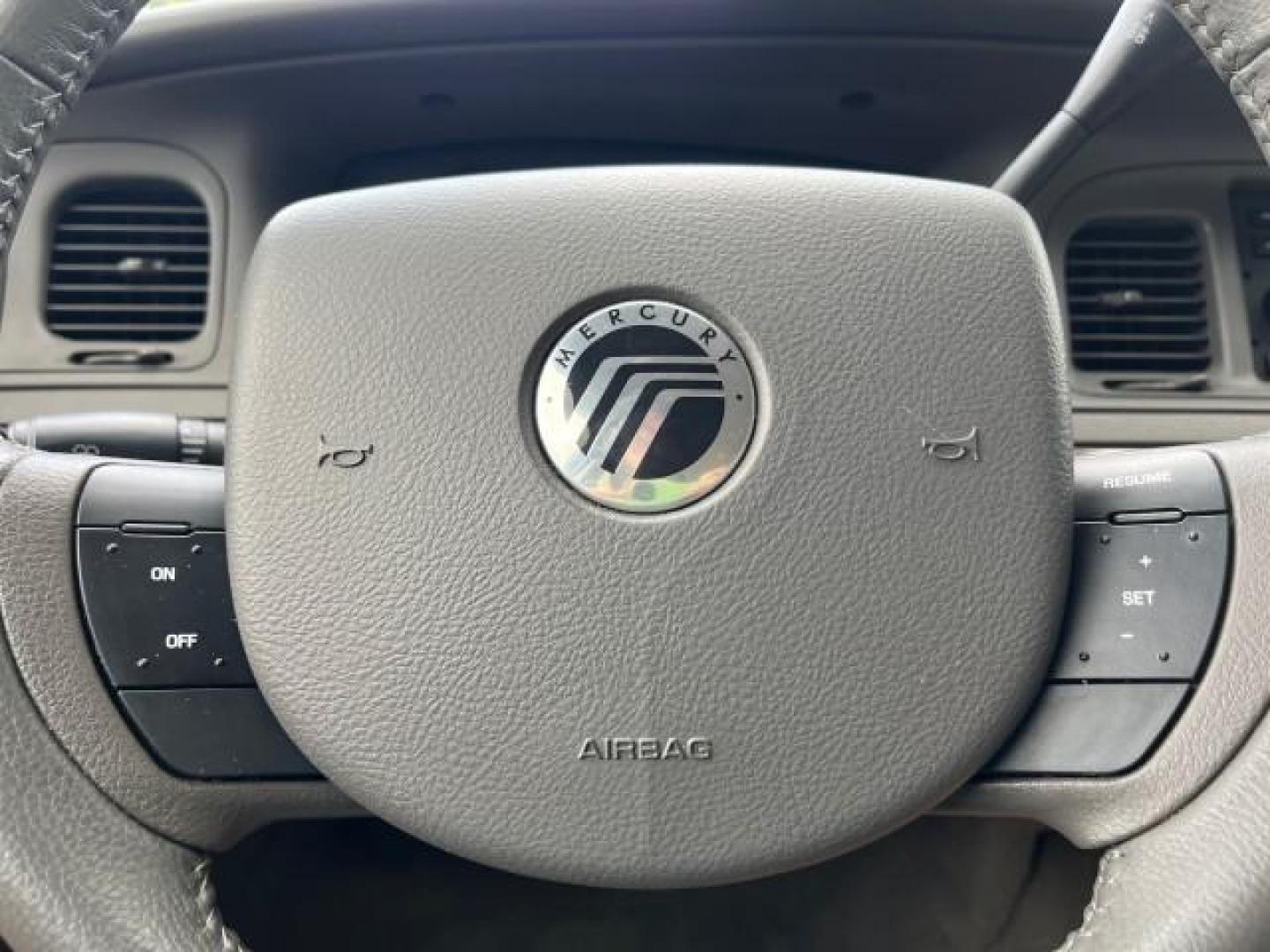 2007 Light Ice Blue Metallic /Medium Light Stone Mercury Grand Marquis LS LOW MILES 63,188 (2MEFM75V77X) with an 4.6L SOHC FFV V8 Engine engine, Automatic transmission, located at 4701 North Dixie Hwy, Pompano Beach, FL, 33064, (954) 422-2889, 26.240938, -80.123474 - OUR WEBPAGE FLORIDACARS1.COM HAS OVER 100 PHOTOS AND FREE CARFAX LINK 2007 MERCURY GRAND MARQUIS LS ROAD READY 4.6L V8 VIN: 2MEFM75V77X617644 FLORIDA OWNER SEDAN 4 DR LOW MILES 63,188 4.6L V8 F SOHC NO RECALLS FLEX FUEL 15 SERVICE RECORDS REAR WHEEL DRIVE POWER LEATHER SEATS Adaptive Headlights Adju - Photo#42