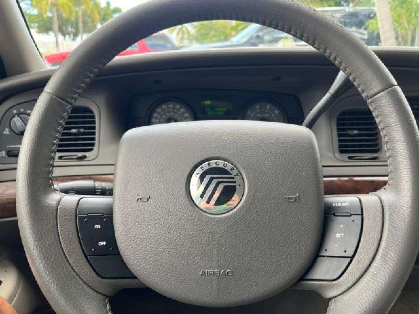 2007 Light Ice Blue Metallic /Medium Light Stone Mercury Grand Marquis LS LOW MILES 63,188 (2MEFM75V77X) with an 4.6L SOHC FFV V8 Engine engine, Automatic transmission, located at 4701 North Dixie Hwy, Pompano Beach, FL, 33064, (954) 422-2889, 26.240938, -80.123474 - OUR WEBPAGE FLORIDACARS1.COM HAS OVER 100 PHOTOS AND FREE CARFAX LINK 2007 MERCURY GRAND MARQUIS LS ROAD READY 4.6L V8 VIN: 2MEFM75V77X617644 FLORIDA OWNER SEDAN 4 DR LOW MILES 63,188 4.6L V8 F SOHC NO RECALLS FLEX FUEL 15 SERVICE RECORDS REAR WHEEL DRIVE POWER LEATHER SEATS Adaptive Headlights Adju - Photo#54