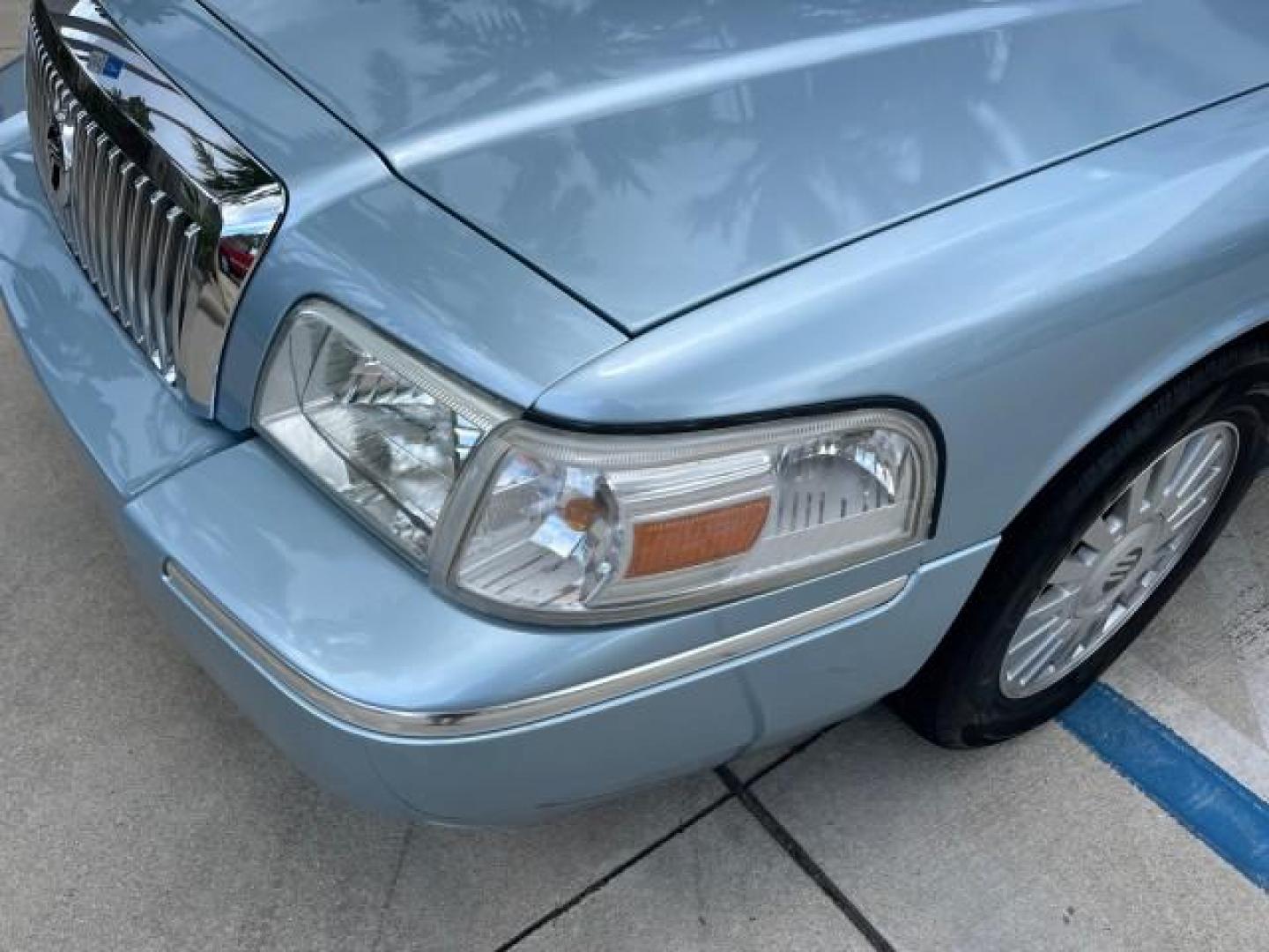 2007 Light Ice Blue Metallic /Medium Light Stone Mercury Grand Marquis LS LOW MILES 63,188 (2MEFM75V77X) with an 4.6L SOHC FFV V8 Engine engine, Automatic transmission, located at 4701 North Dixie Hwy, Pompano Beach, FL, 33064, (954) 422-2889, 26.240938, -80.123474 - OUR WEBPAGE FLORIDACARS1.COM HAS OVER 100 PHOTOS AND FREE CARFAX LINK 2007 MERCURY GRAND MARQUIS LS ROAD READY 4.6L V8 VIN: 2MEFM75V77X617644 FLORIDA OWNER SEDAN 4 DR LOW MILES 63,188 4.6L V8 F SOHC NO RECALLS FLEX FUEL 15 SERVICE RECORDS REAR WHEEL DRIVE POWER LEATHER SEATS Adaptive Headlights Adju - Photo#71