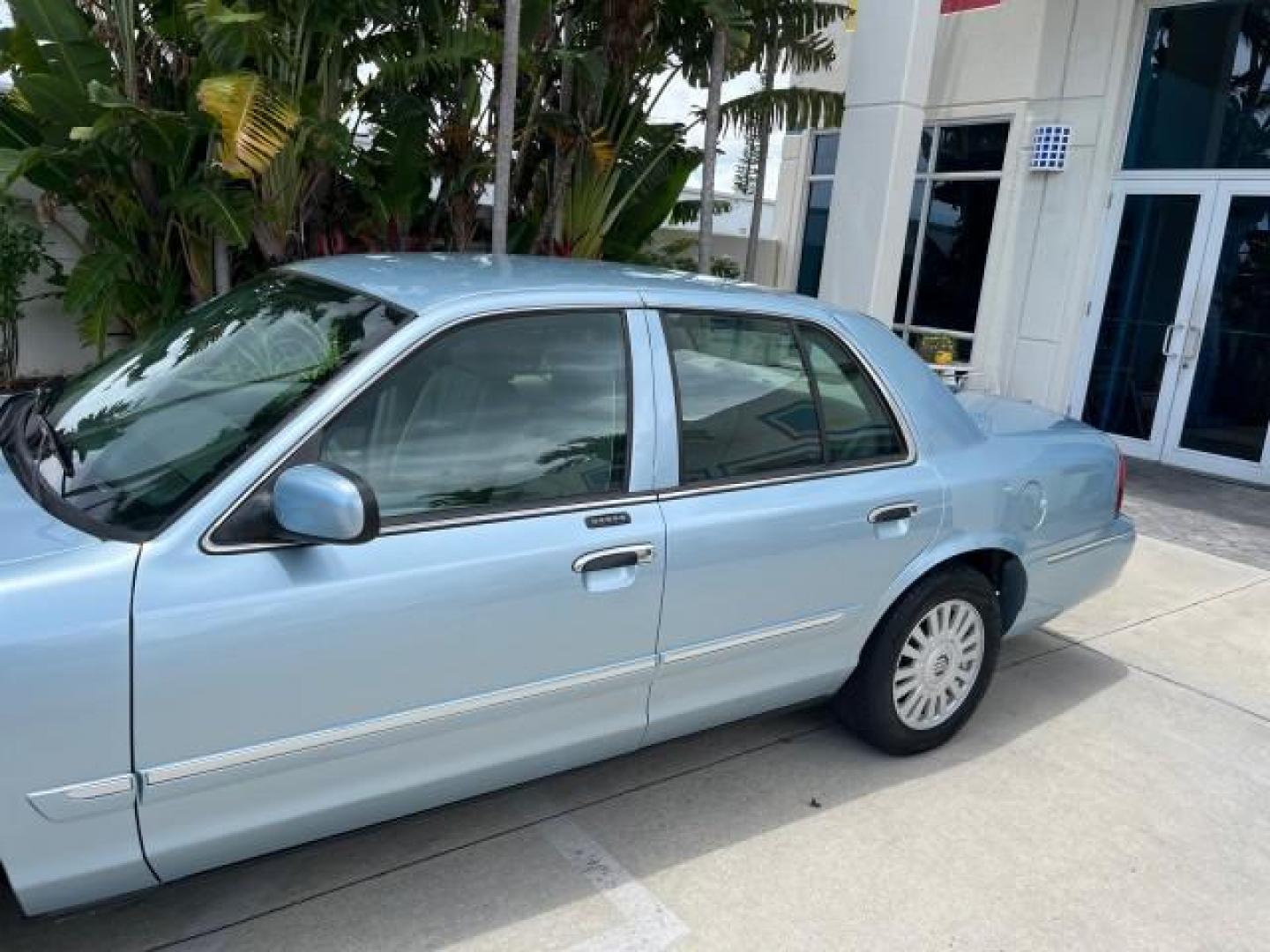 2007 Light Ice Blue Metallic /Medium Light Stone Mercury Grand Marquis LS LOW MILES 63,188 (2MEFM75V77X) with an 4.6L SOHC FFV V8 Engine engine, Automatic transmission, located at 4701 North Dixie Hwy, Pompano Beach, FL, 33064, (954) 422-2889, 26.240938, -80.123474 - OUR WEBPAGE FLORIDACARS1.COM HAS OVER 100 PHOTOS AND FREE CARFAX LINK 2007 MERCURY GRAND MARQUIS LS ROAD READY 4.6L V8 VIN: 2MEFM75V77X617644 FLORIDA OWNER SEDAN 4 DR LOW MILES 63,188 4.6L V8 F SOHC NO RECALLS FLEX FUEL 15 SERVICE RECORDS REAR WHEEL DRIVE POWER LEATHER SEATS Adaptive Headlights Adju - Photo#75