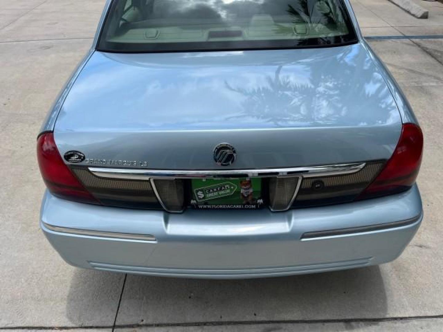 2007 Light Ice Blue Metallic /Medium Light Stone Mercury Grand Marquis LS LOW MILES 63,188 (2MEFM75V77X) with an 4.6L SOHC FFV V8 Engine engine, Automatic transmission, located at 4701 North Dixie Hwy, Pompano Beach, FL, 33064, (954) 422-2889, 26.240938, -80.123474 - OUR WEBPAGE FLORIDACARS1.COM HAS OVER 100 PHOTOS AND FREE CARFAX LINK 2007 MERCURY GRAND MARQUIS LS ROAD READY 4.6L V8 VIN: 2MEFM75V77X617644 FLORIDA OWNER SEDAN 4 DR LOW MILES 63,188 4.6L V8 F SOHC NO RECALLS FLEX FUEL 15 SERVICE RECORDS REAR WHEEL DRIVE POWER LEATHER SEATS Adaptive Headlights Adju - Photo#96