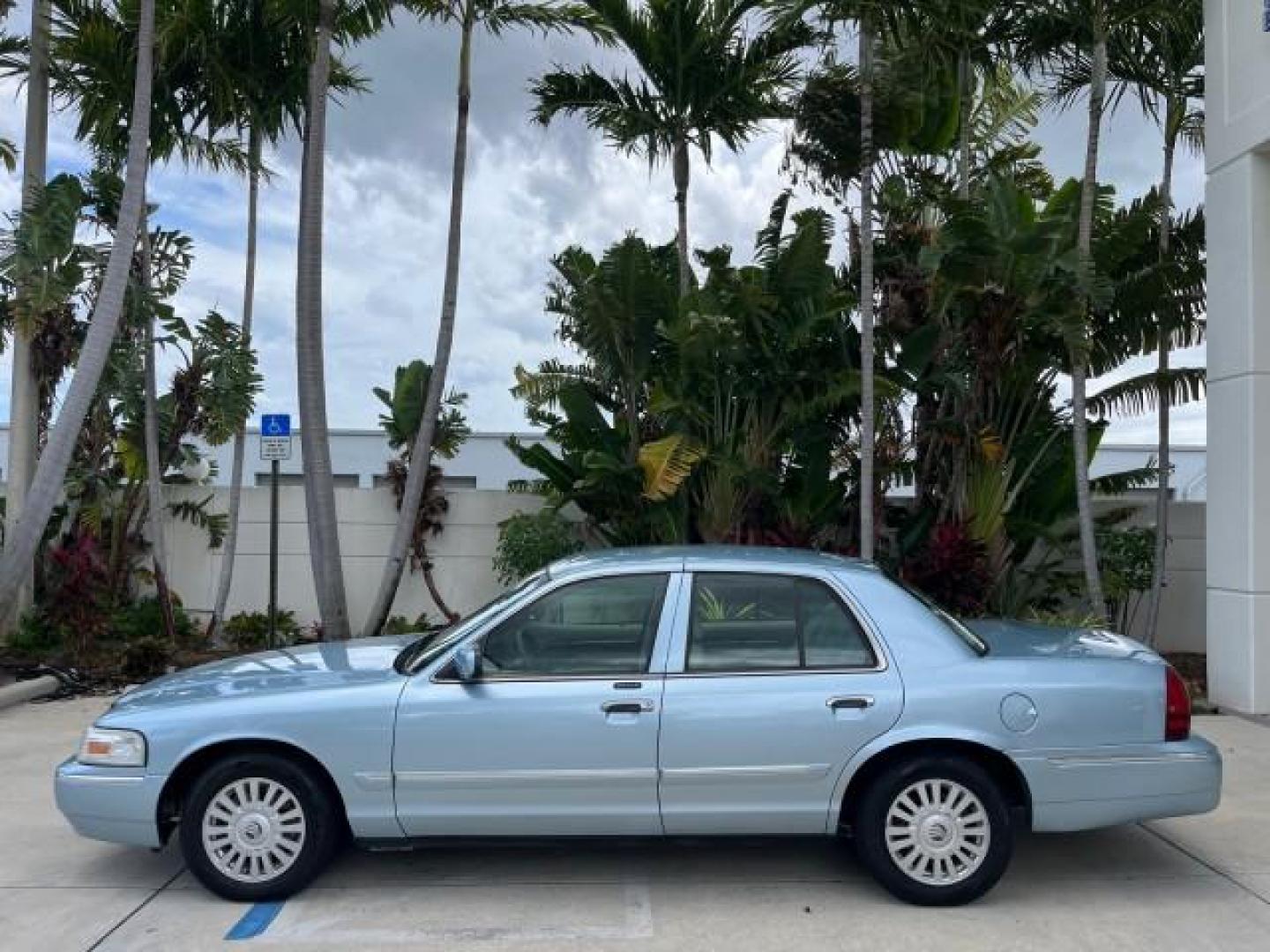 2007 Light Ice Blue Metallic /Medium Light Stone Mercury Grand Marquis LS LOW MILES 63,188 (2MEFM75V77X) with an 4.6L SOHC FFV V8 Engine engine, Automatic transmission, located at 4701 North Dixie Hwy, Pompano Beach, FL, 33064, (954) 422-2889, 26.240938, -80.123474 - OUR WEBPAGE FLORIDACARS1.COM HAS OVER 100 PHOTOS AND FREE CARFAX LINK 2007 MERCURY GRAND MARQUIS LS ROAD READY 4.6L V8 VIN: 2MEFM75V77X617644 FLORIDA OWNER SEDAN 4 DR LOW MILES 63,188 4.6L V8 F SOHC NO RECALLS FLEX FUEL 15 SERVICE RECORDS REAR WHEEL DRIVE POWER LEATHER SEATS Adaptive Headlights Adju - Photo#97