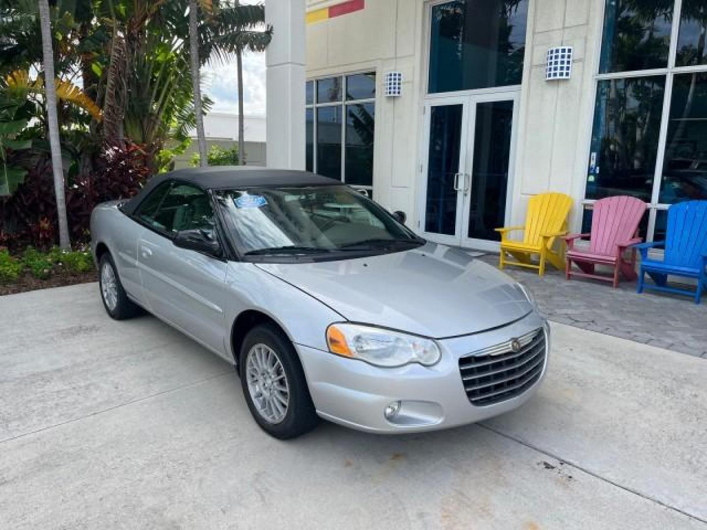 2005 Bright Silver Metallic /Dark Slate Gray Chrysler Sebring Conv Touring LOW MILES 73,711 (1C3EL55R35N) with an 2.7L DOHC SMPI 24-Valve V6 Engine engine, Automatic transmission, located at 4701 North Dixie Hwy, Pompano Beach, FL, 33064, (954) 422-2889, 26.240938, -80.123474 - OUR WEBPAGE FLORIDACARS1.COM HAS OVER 100 PHOTOS AND FREE CARFAX LINK 2005 CHRYSLER SEBRING TOURING ROAD READY 2.7L V6 VIN: 1C3EL55R35N595409 NO ACCIDENTS 28 MPG CONVERTIBLE NO RECALLS 2.7L V6 F DOHC 24V LOW MILES 73,711 GASOLINE POWER MIRRORS FLORIDA OWNER FRONT WHEEL DRIVE POWER SEATS POWER CONVER - Photo#1