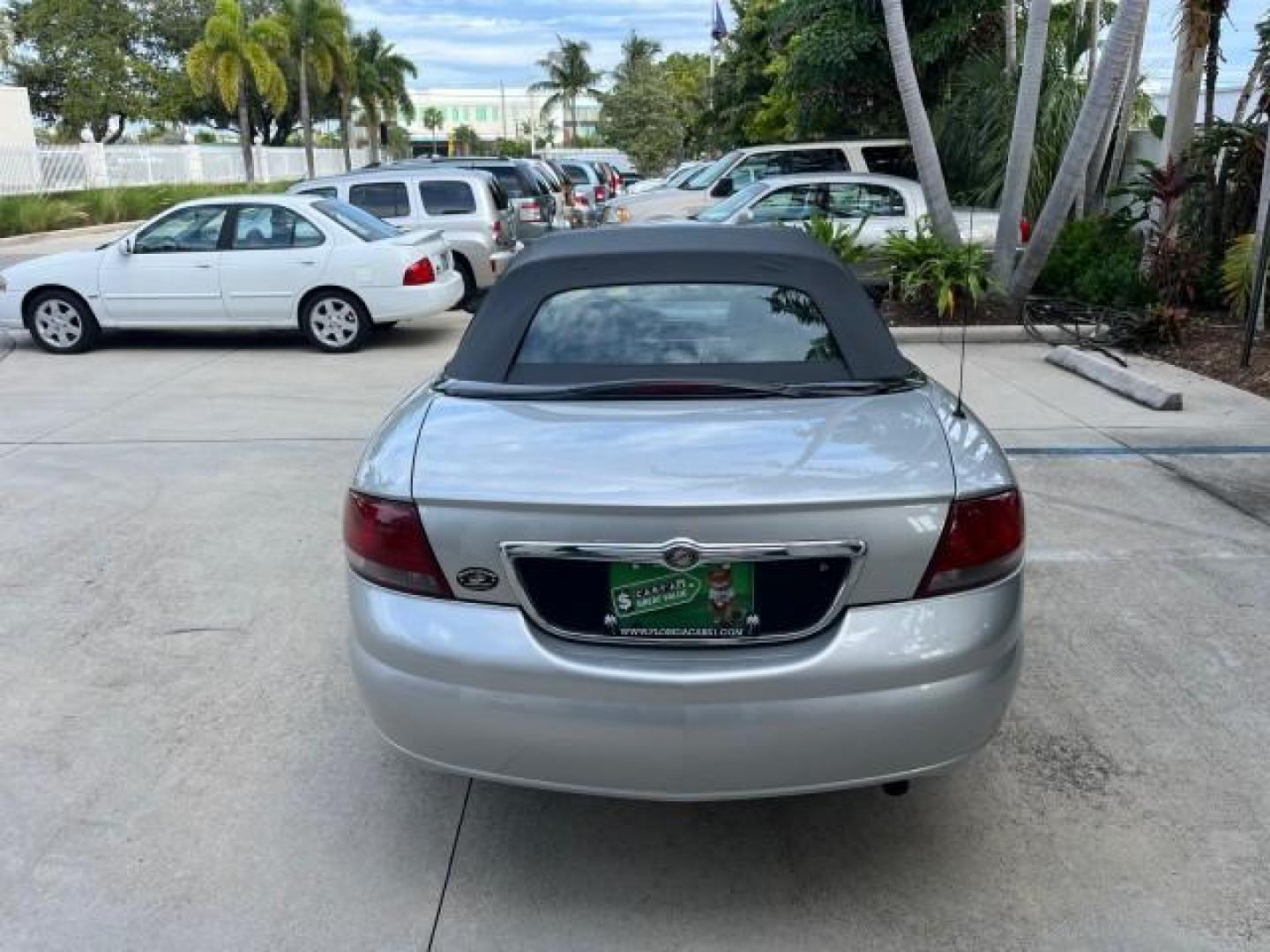 2005 Bright Silver Metallic /Dark Slate Gray Chrysler Sebring Conv Touring LOW MILES 73,711 (1C3EL55R35N) with an 2.7L DOHC SMPI 24-Valve V6 Engine engine, Automatic transmission, located at 4701 North Dixie Hwy, Pompano Beach, FL, 33064, (954) 422-2889, 26.240938, -80.123474 - OUR WEBPAGE FLORIDACARS1.COM HAS OVER 100 PHOTOS AND FREE CARFAX LINK 2005 CHRYSLER SEBRING TOURING ROAD READY 2.7L V6 VIN: 1C3EL55R35N595409 NO ACCIDENTS 28 MPG CONVERTIBLE NO RECALLS 2.7L V6 F DOHC 24V LOW MILES 73,711 GASOLINE POWER MIRRORS FLORIDA OWNER FRONT WHEEL DRIVE POWER SEATS POWER CONVER - Photo#6