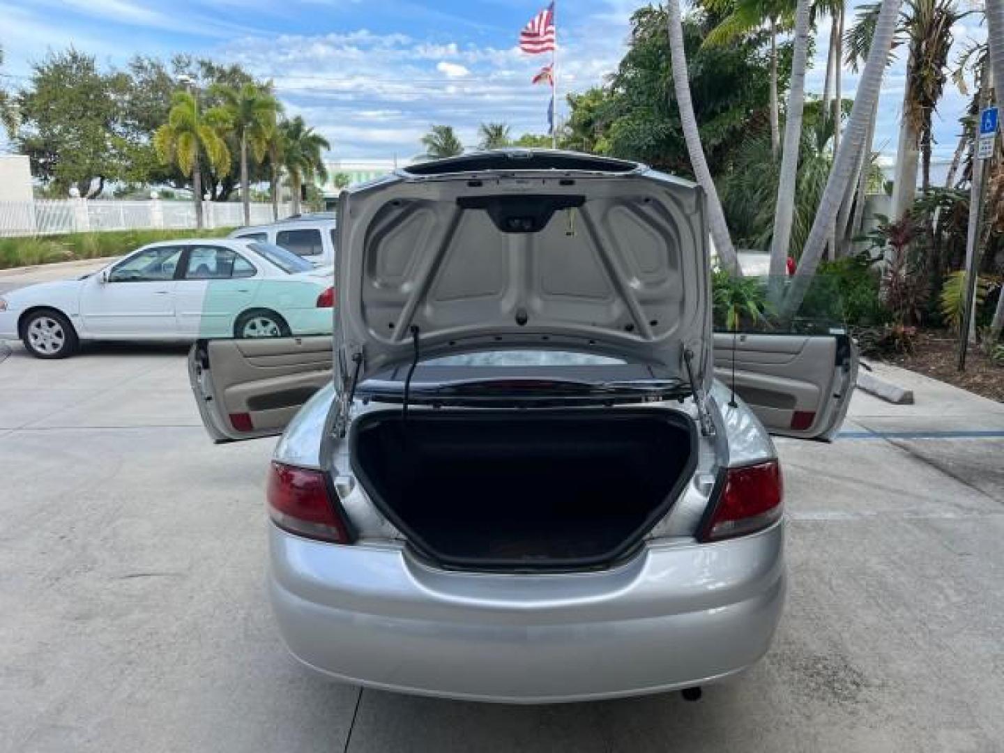 2005 Bright Silver Metallic /Dark Slate Gray Chrysler Sebring Conv Touring LOW MILES 73,711 (1C3EL55R35N) with an 2.7L DOHC SMPI 24-Valve V6 Engine engine, Automatic transmission, located at 4701 North Dixie Hwy, Pompano Beach, FL, 33064, (954) 422-2889, 26.240938, -80.123474 - OUR WEBPAGE FLORIDACARS1.COM HAS OVER 100 PHOTOS AND FREE CARFAX LINK 2005 CHRYSLER SEBRING TOURING ROAD READY 2.7L V6 VIN: 1C3EL55R35N595409 NO ACCIDENTS 28 MPG CONVERTIBLE NO RECALLS 2.7L V6 F DOHC 24V LOW MILES 73,711 GASOLINE POWER MIRRORS FLORIDA OWNER FRONT WHEEL DRIVE POWER SEATS POWER CONVER - Photo#54