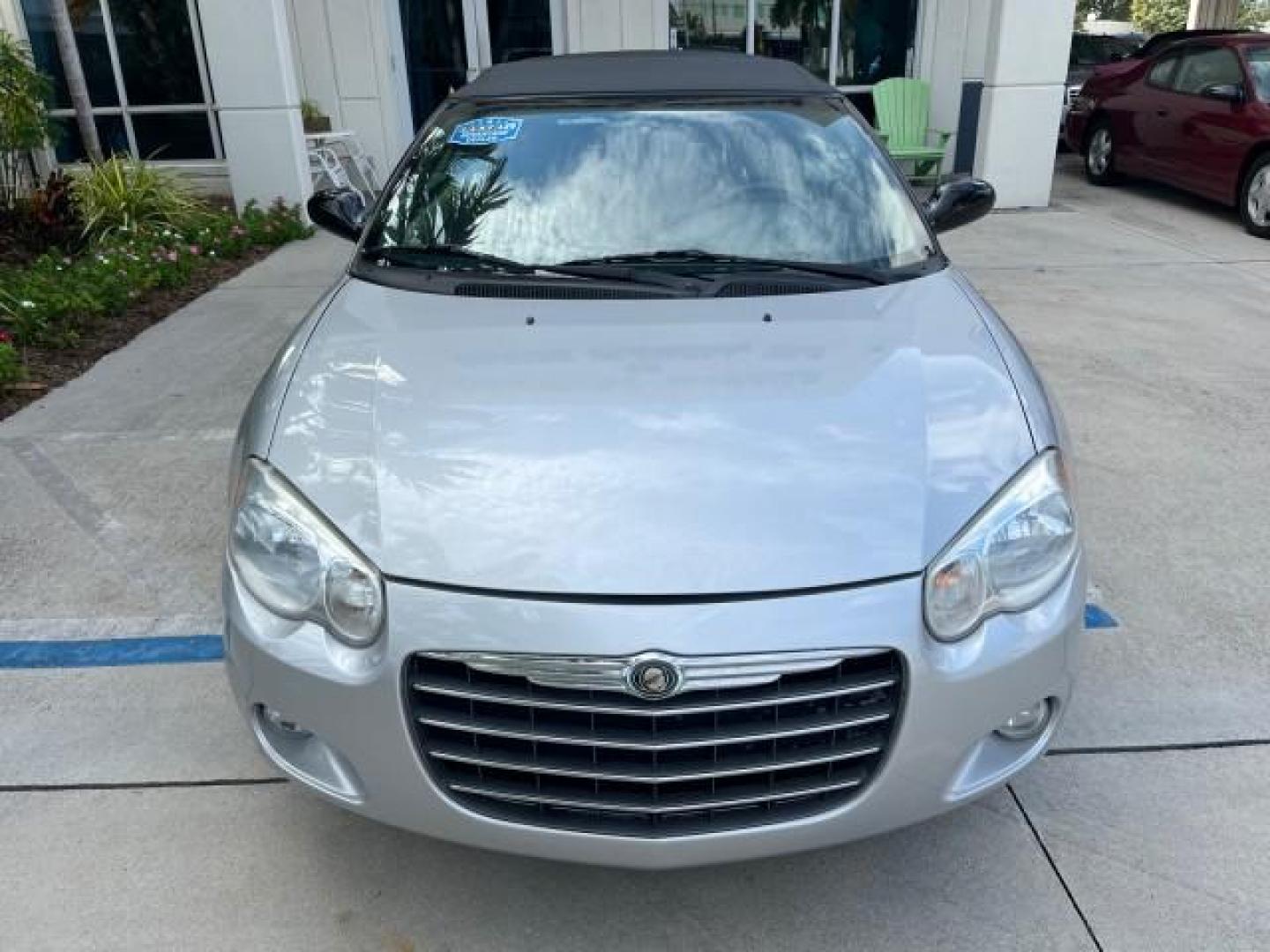 2005 Bright Silver Metallic /Dark Slate Gray Chrysler Sebring Conv Touring LOW MILES 73,711 (1C3EL55R35N) with an 2.7L DOHC SMPI 24-Valve V6 Engine engine, Automatic transmission, located at 4701 North Dixie Hwy, Pompano Beach, FL, 33064, (954) 422-2889, 26.240938, -80.123474 - OUR WEBPAGE FLORIDACARS1.COM HAS OVER 100 PHOTOS AND FREE CARFAX LINK 2005 CHRYSLER SEBRING TOURING ROAD READY 2.7L V6 VIN: 1C3EL55R35N595409 NO ACCIDENTS 28 MPG CONVERTIBLE NO RECALLS 2.7L V6 F DOHC 24V LOW MILES 73,711 GASOLINE POWER MIRRORS FLORIDA OWNER FRONT WHEEL DRIVE POWER SEATS POWER CONVER - Photo#69