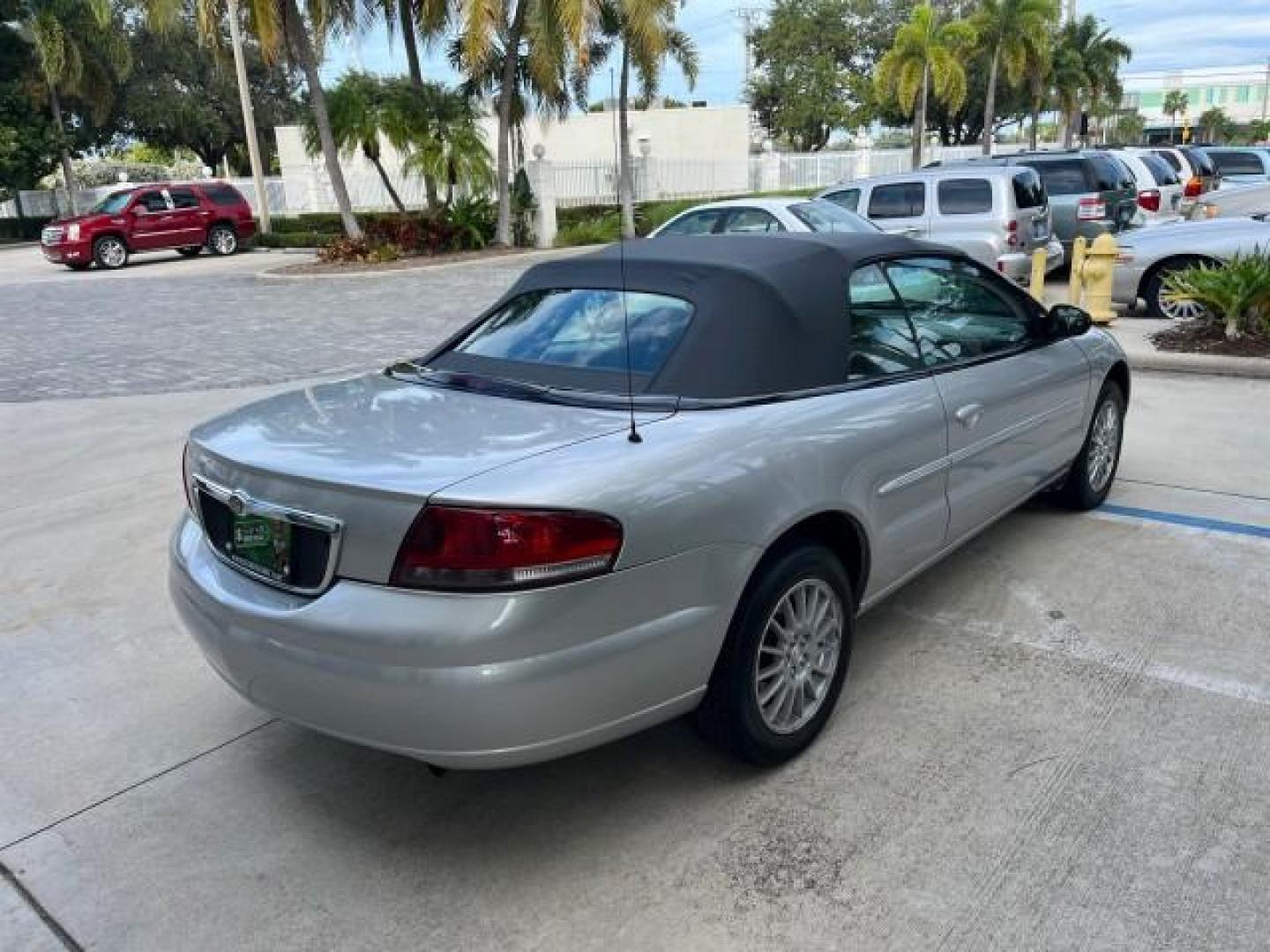 2005 Bright Silver Metallic /Dark Slate Gray Chrysler Sebring Conv Touring LOW MILES 73,711 (1C3EL55R35N) with an 2.7L DOHC SMPI 24-Valve V6 Engine engine, Automatic transmission, located at 4701 North Dixie Hwy, Pompano Beach, FL, 33064, (954) 422-2889, 26.240938, -80.123474 - OUR WEBPAGE FLORIDACARS1.COM HAS OVER 100 PHOTOS AND FREE CARFAX LINK 2005 CHRYSLER SEBRING TOURING ROAD READY 2.7L V6 VIN: 1C3EL55R35N595409 NO ACCIDENTS 28 MPG CONVERTIBLE NO RECALLS 2.7L V6 F DOHC 24V LOW MILES 73,711 GASOLINE POWER MIRRORS FLORIDA OWNER FRONT WHEEL DRIVE POWER SEATS POWER CONVER - Photo#82