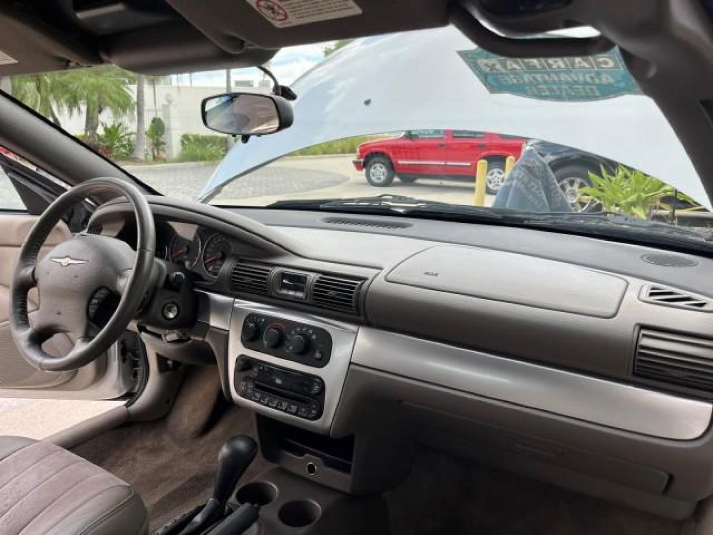 2005 Bright Silver Metallic /Dark Slate Gray Chrysler Sebring Conv Touring LOW MILES 73,711 (1C3EL55R35N) with an 2.7L DOHC SMPI 24-Valve V6 Engine engine, Automatic transmission, located at 4701 North Dixie Hwy, Pompano Beach, FL, 33064, (954) 422-2889, 26.240938, -80.123474 - OUR WEBPAGE FLORIDACARS1.COM HAS OVER 100 PHOTOS AND FREE CARFAX LINK 2005 CHRYSLER SEBRING TOURING ROAD READY 2.7L V6 VIN: 1C3EL55R35N595409 NO ACCIDENTS 28 MPG CONVERTIBLE NO RECALLS 2.7L V6 F DOHC 24V LOW MILES 73,711 GASOLINE POWER MIRRORS FLORIDA OWNER FRONT WHEEL DRIVE POWER SEATS POWER CONVER - Photo#53