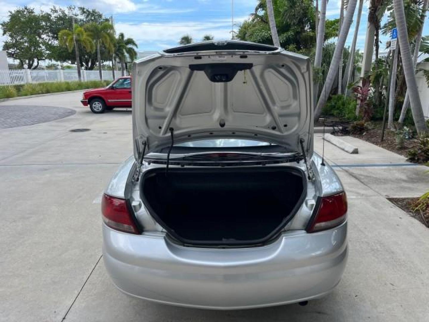 2005 Bright Silver Metallic /Dark Slate Gray Chrysler Sebring Conv Touring LOW MILES 73,711 (1C3EL55R35N) with an 2.7L DOHC SMPI 24-Valve V6 Engine engine, Automatic transmission, located at 4701 North Dixie Hwy, Pompano Beach, FL, 33064, (954) 422-2889, 26.240938, -80.123474 - OUR WEBPAGE FLORIDACARS1.COM HAS OVER 100 PHOTOS AND FREE CARFAX LINK 2005 CHRYSLER SEBRING TOURING ROAD READY 2.7L V6 VIN: 1C3EL55R35N595409 NO ACCIDENTS 28 MPG CONVERTIBLE NO RECALLS 2.7L V6 F DOHC 24V LOW MILES 73,711 GASOLINE POWER MIRRORS FLORIDA OWNER FRONT WHEEL DRIVE POWER SEATS POWER CONVER - Photo#55