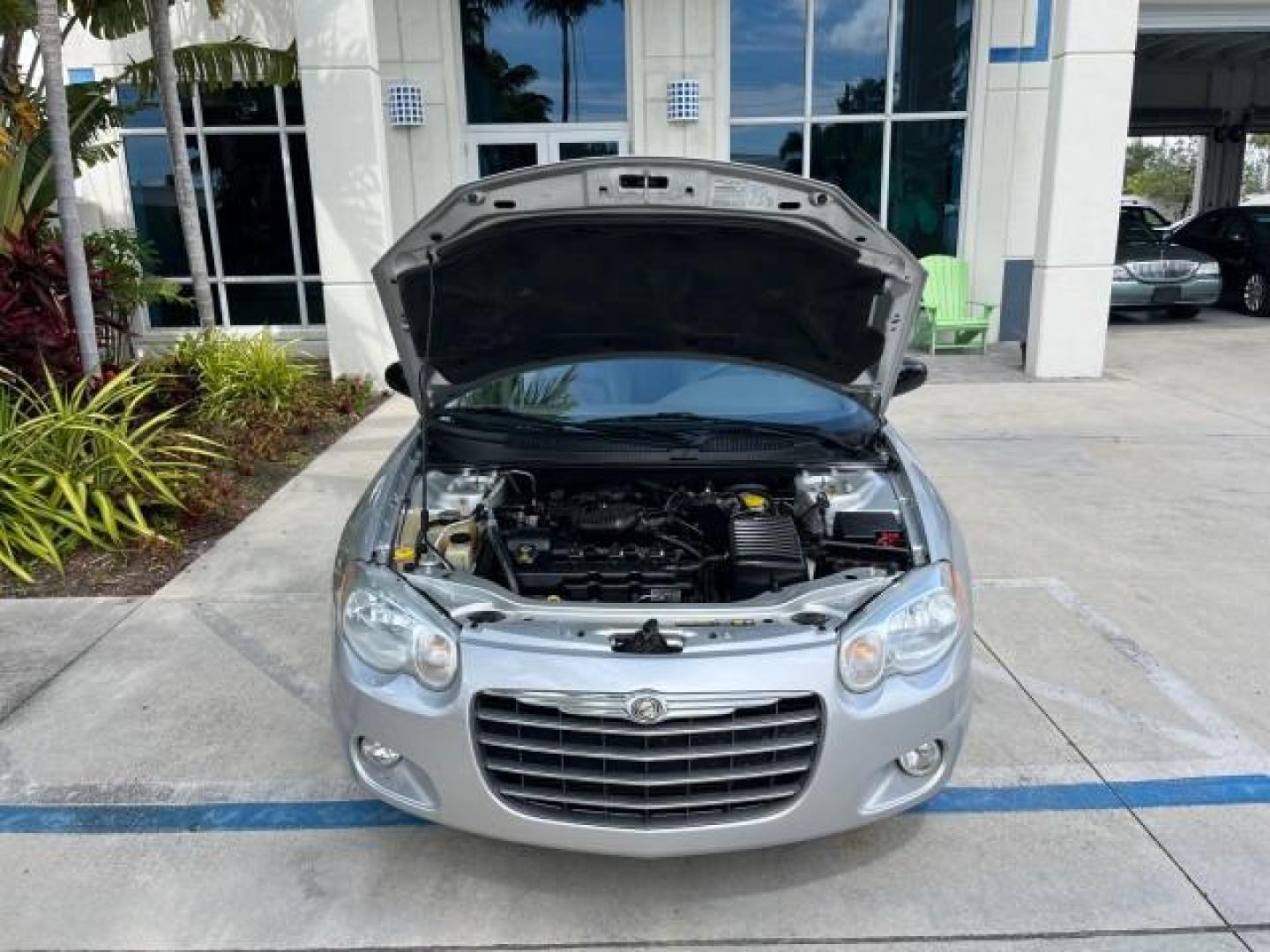 2005 Bright Silver Metallic /Dark Slate Gray Chrysler Sebring Conv Touring LOW MILES 73,711 (1C3EL55R35N) with an 2.7L DOHC SMPI 24-Valve V6 Engine engine, Automatic transmission, located at 4701 North Dixie Hwy, Pompano Beach, FL, 33064, (954) 422-2889, 26.240938, -80.123474 - OUR WEBPAGE FLORIDACARS1.COM HAS OVER 100 PHOTOS AND FREE CARFAX LINK 2005 CHRYSLER SEBRING TOURING ROAD READY 2.7L V6 VIN: 1C3EL55R35N595409 NO ACCIDENTS 28 MPG CONVERTIBLE NO RECALLS 2.7L V6 F DOHC 24V LOW MILES 73,711 GASOLINE POWER MIRRORS FLORIDA OWNER FRONT WHEEL DRIVE POWER SEATS POWER CONVER - Photo#58