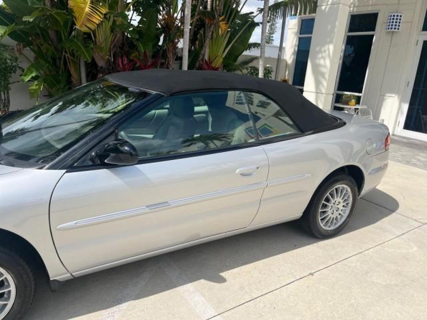 2005 Bright Silver Metallic /Dark Slate Gray Chrysler Sebring Conv Touring LOW MILES 73,711 (1C3EL55R35N) with an 2.7L DOHC SMPI 24-Valve V6 Engine engine, Automatic transmission, located at 4701 North Dixie Hwy, Pompano Beach, FL, 33064, (954) 422-2889, 26.240938, -80.123474 - OUR WEBPAGE FLORIDACARS1.COM HAS OVER 100 PHOTOS AND FREE CARFAX LINK 2005 CHRYSLER SEBRING TOURING ROAD READY 2.7L V6 VIN: 1C3EL55R35N595409 NO ACCIDENTS 28 MPG CONVERTIBLE NO RECALLS 2.7L V6 F DOHC 24V LOW MILES 73,711 GASOLINE POWER MIRRORS FLORIDA OWNER FRONT WHEEL DRIVE POWER SEATS POWER CONVER - Photo#76