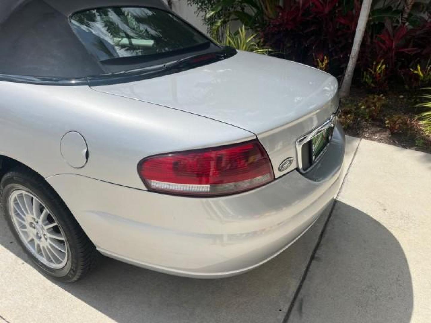 2005 Bright Silver Metallic /Dark Slate Gray Chrysler Sebring Conv Touring LOW MILES 73,711 (1C3EL55R35N) with an 2.7L DOHC SMPI 24-Valve V6 Engine engine, Automatic transmission, located at 4701 North Dixie Hwy, Pompano Beach, FL, 33064, (954) 422-2889, 26.240938, -80.123474 - OUR WEBPAGE FLORIDACARS1.COM HAS OVER 100 PHOTOS AND FREE CARFAX LINK 2005 CHRYSLER SEBRING TOURING ROAD READY 2.7L V6 VIN: 1C3EL55R35N595409 NO ACCIDENTS 28 MPG CONVERTIBLE NO RECALLS 2.7L V6 F DOHC 24V LOW MILES 73,711 GASOLINE POWER MIRRORS FLORIDA OWNER FRONT WHEEL DRIVE POWER SEATS POWER CONVER - Photo#89