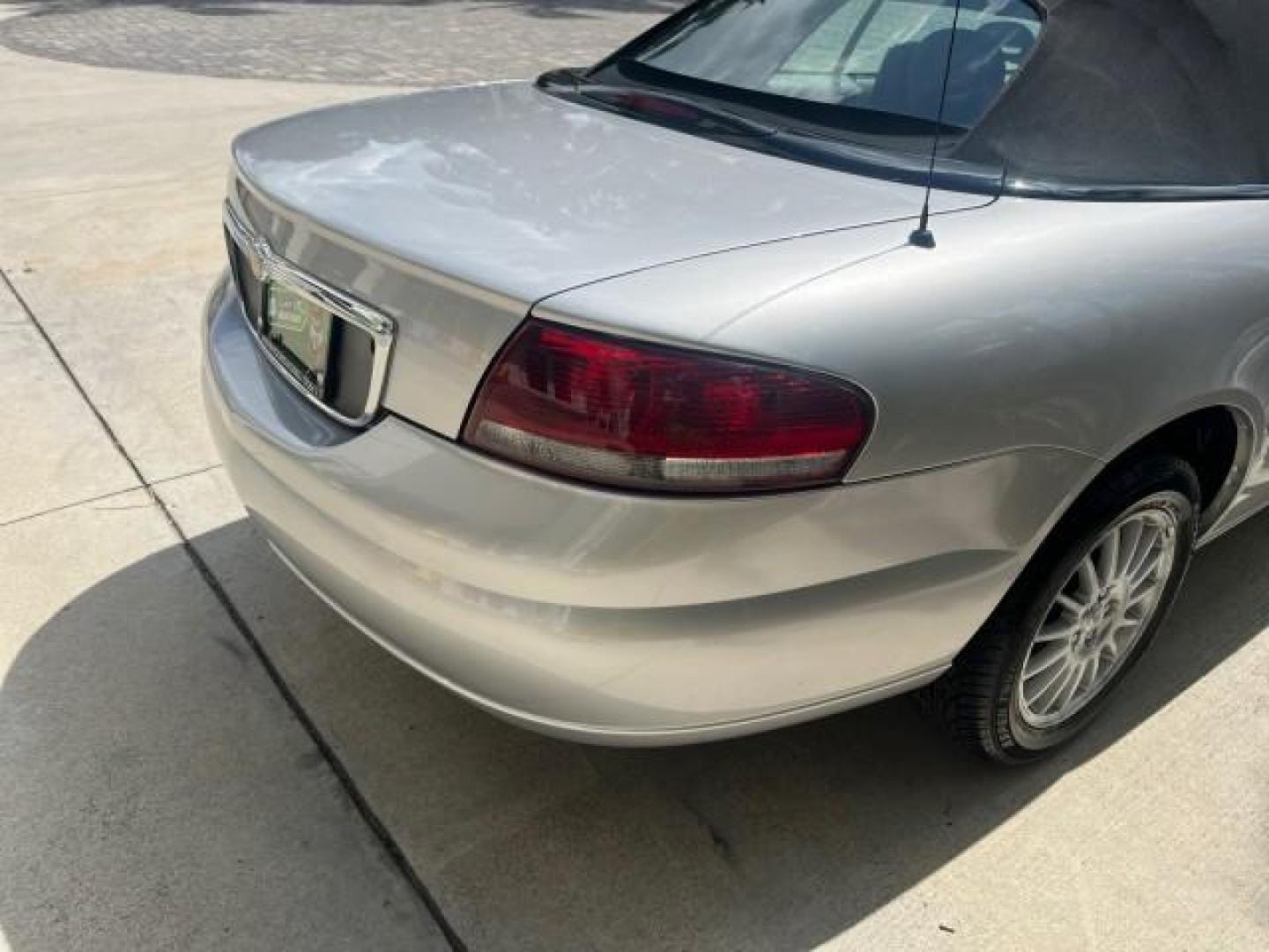 2005 Bright Silver Metallic /Dark Slate Gray Chrysler Sebring Conv Touring LOW MILES 73,711 (1C3EL55R35N) with an 2.7L DOHC SMPI 24-Valve V6 Engine engine, Automatic transmission, located at 4701 North Dixie Hwy, Pompano Beach, FL, 33064, (954) 422-2889, 26.240938, -80.123474 - OUR WEBPAGE FLORIDACARS1.COM HAS OVER 100 PHOTOS AND FREE CARFAX LINK 2005 CHRYSLER SEBRING TOURING ROAD READY 2.7L V6 VIN: 1C3EL55R35N595409 NO ACCIDENTS 28 MPG CONVERTIBLE NO RECALLS 2.7L V6 F DOHC 24V LOW MILES 73,711 GASOLINE POWER MIRRORS FLORIDA OWNER FRONT WHEEL DRIVE POWER SEATS POWER CONVER - Photo#90