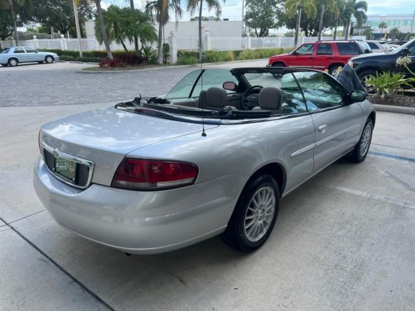 2005 Bright Silver Metallic /Dark Slate Gray Chrysler Sebring Conv Touring LOW MILES 73,711 (1C3EL55R35N) with an 2.7L DOHC SMPI 24-Valve V6 Engine engine, Automatic transmission, located at 4701 North Dixie Hwy, Pompano Beach, FL, 33064, (954) 422-2889, 26.240938, -80.123474 - OUR WEBPAGE FLORIDACARS1.COM HAS OVER 100 PHOTOS AND FREE CARFAX LINK 2005 CHRYSLER SEBRING TOURING ROAD READY 2.7L V6 VIN: 1C3EL55R35N595409 NO ACCIDENTS 28 MPG CONVERTIBLE NO RECALLS 2.7L V6 F DOHC 24V LOW MILES 73,711 GASOLINE POWER MIRRORS FLORIDA OWNER FRONT WHEEL DRIVE POWER SEATS POWER CONVER - Photo#95