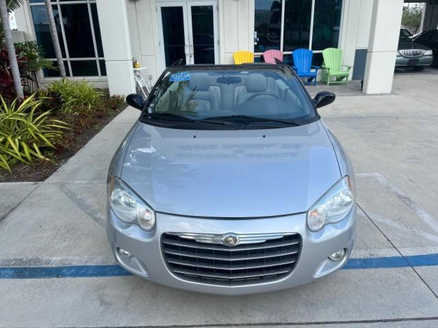 2005 Bright Silver Metallic /Dark Slate Gray Chrysler Sebring Conv Touring LOW MILES 73,711 (1C3EL55R35N) with an 2.7L DOHC SMPI 24-Valve V6 Engine engine, Automatic transmission, located at 4701 North Dixie Hwy, Pompano Beach, FL, 33064, (954) 422-2889, 26.240938, -80.123474 - OUR WEBPAGE FLORIDACARS1.COM HAS OVER 100 PHOTOS AND FREE CARFAX LINK 2005 CHRYSLER SEBRING TOURING ROAD READY 2.7L V6 VIN: 1C3EL55R35N595409 NO ACCIDENTS 28 MPG CONVERTIBLE NO RECALLS 2.7L V6 F DOHC 24V LOW MILES 73,711 GASOLINE POWER MIRRORS FLORIDA OWNER FRONT WHEEL DRIVE POWER SEATS POWER CONVER - Photo#97