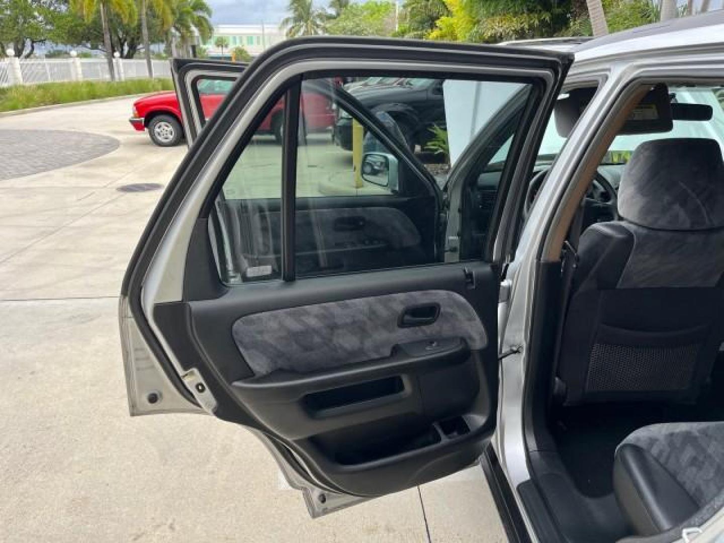 2003 Satin Silver Metallic /Black Honda CR-V EX LOW MILES 78,365 (SHSRD78823U) with an 2.4L DOHC i-VTEC 16-Valve I4 Engine engine, Automatic transmission, located at 4701 North Dixie Hwy, Pompano Beach, FL, 33064, (954) 422-2889, 26.240938, -80.123474 - OUR WEBPAGE FLORIDACARS1.COM HAS OVER 100 PHOTOS AND FREE CARFAX LINK 2003 HONDA CR-V EX ROAD READY 2.4L I4 VIN: SHSRD78823U134764 FLORIDA OWNER 4 DOOR WAGON/SPORT UTILITY LOW MILES 78,365 2.4L I4 F DOHC ALL WHEEL DRIVE GASOLINE 7 SERVICE RECORDS ALL WHEEL DRIVE POWER SUNROOF AWD Alloy Wheels Approa - Photo#14