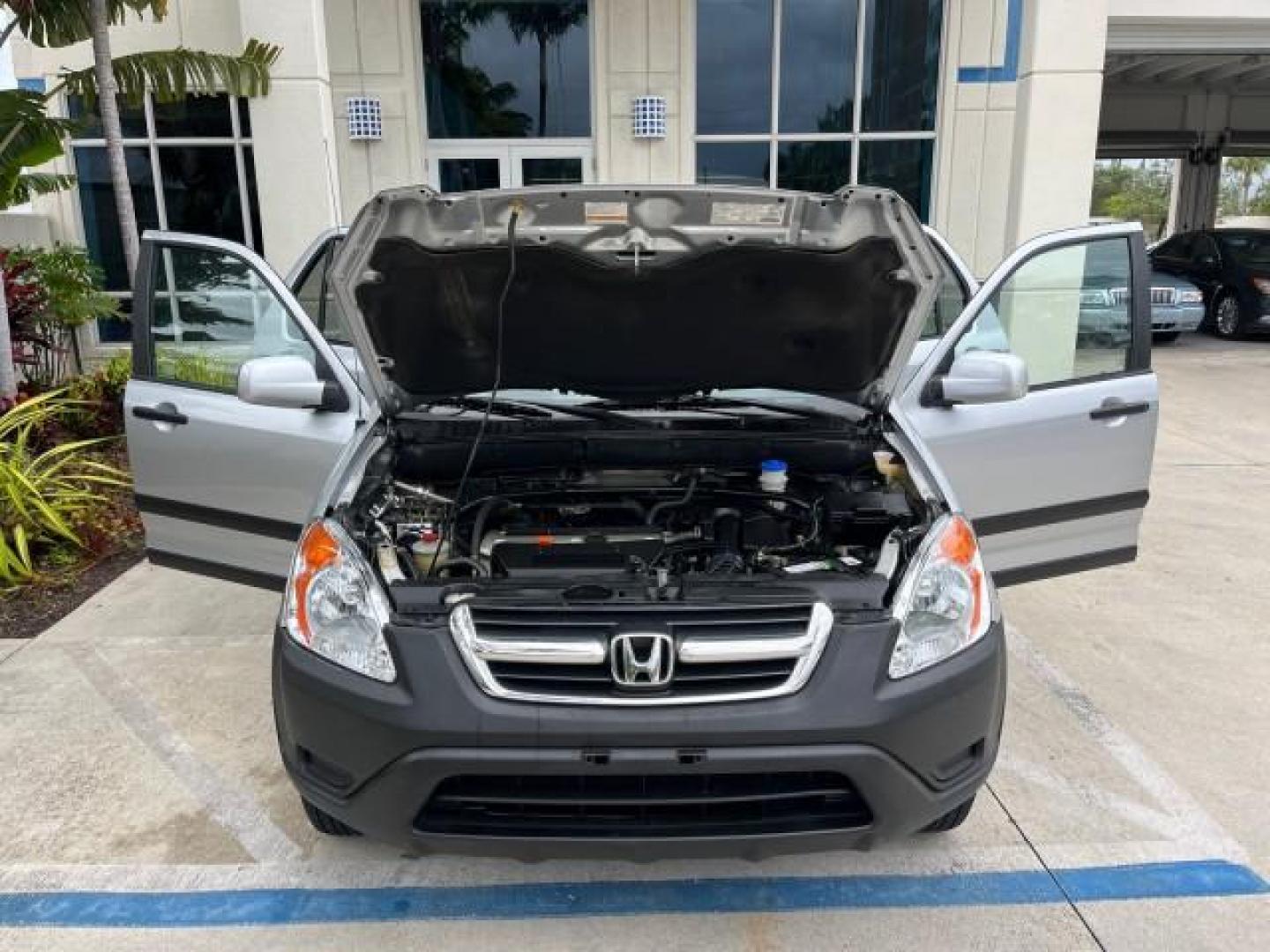 2003 Satin Silver Metallic /Black Honda CR-V EX LOW MILES 78,365 (SHSRD78823U) with an 2.4L DOHC i-VTEC 16-Valve I4 Engine engine, Automatic transmission, located at 4701 North Dixie Hwy, Pompano Beach, FL, 33064, (954) 422-2889, 26.240938, -80.123474 - OUR WEBPAGE FLORIDACARS1.COM HAS OVER 100 PHOTOS AND FREE CARFAX LINK 2003 HONDA CR-V EX ROAD READY 2.4L I4 VIN: SHSRD78823U134764 FLORIDA OWNER 4 DOOR WAGON/SPORT UTILITY LOW MILES 78,365 2.4L I4 F DOHC ALL WHEEL DRIVE GASOLINE 7 SERVICE RECORDS ALL WHEEL DRIVE POWER SUNROOF AWD Alloy Wheels Approa - Photo#17