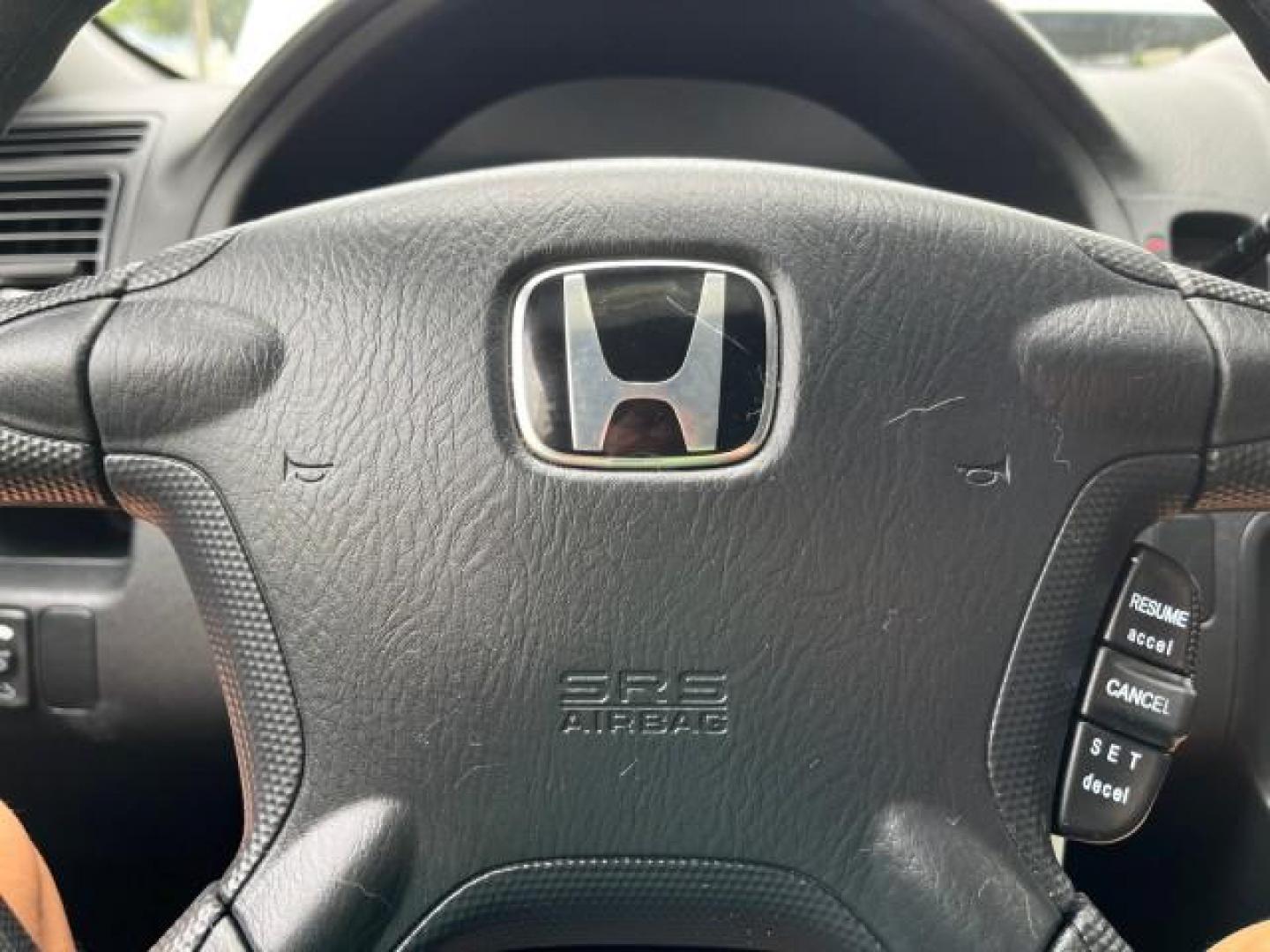 2003 Satin Silver Metallic /Black Honda CR-V EX LOW MILES 78,365 (SHSRD78823U) with an 2.4L DOHC i-VTEC 16-Valve I4 Engine engine, Automatic transmission, located at 4701 North Dixie Hwy, Pompano Beach, FL, 33064, (954) 422-2889, 26.240938, -80.123474 - OUR WEBPAGE FLORIDACARS1.COM HAS OVER 100 PHOTOS AND FREE CARFAX LINK 2003 HONDA CR-V EX ROAD READY 2.4L I4 VIN: SHSRD78823U134764 FLORIDA OWNER 4 DOOR WAGON/SPORT UTILITY LOW MILES 78,365 2.4L I4 F DOHC ALL WHEEL DRIVE GASOLINE 7 SERVICE RECORDS ALL WHEEL DRIVE POWER SUNROOF AWD Alloy Wheels Approa - Photo#48